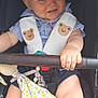 Ezio participe au concours pour gagner de l'argent avec cette photo : baby, blue_eyes, child, closeup, clothing, colorful_cloth, cute, face, hand, happy, infant, legs, padded_straps, seated, skin, smiling, striped_shirt, stroller, teddy_bear, toy