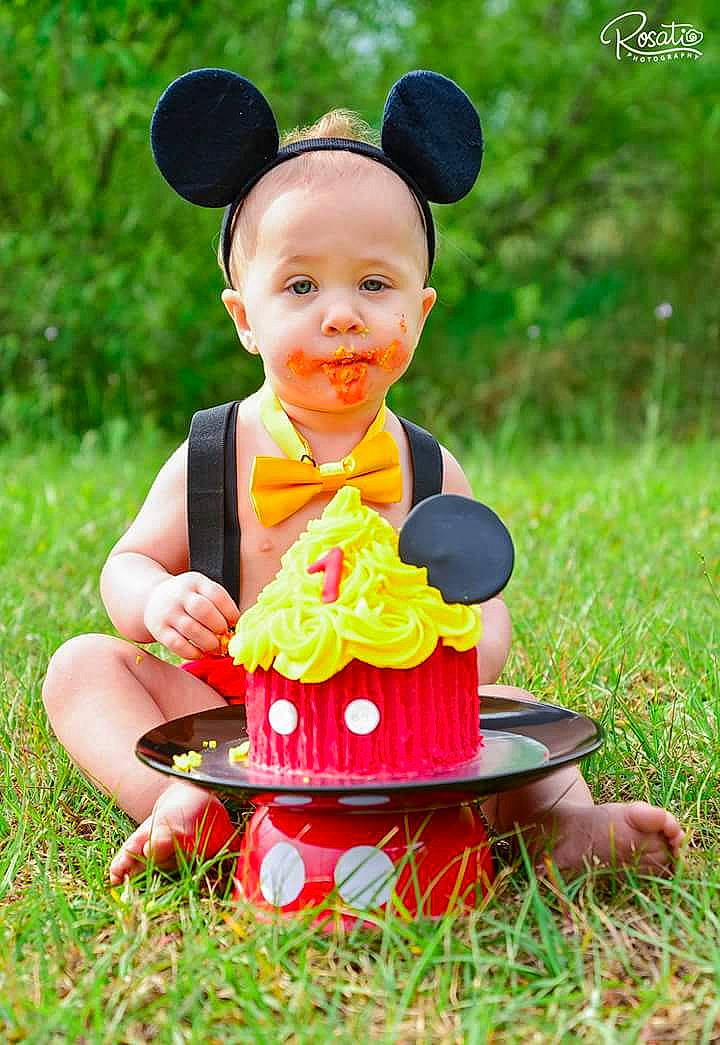 Avery is registered to the contest to win money with this photo: baby, child, costume, fun, grass, happy, person, photography, play, red, smile, toddler, yellow