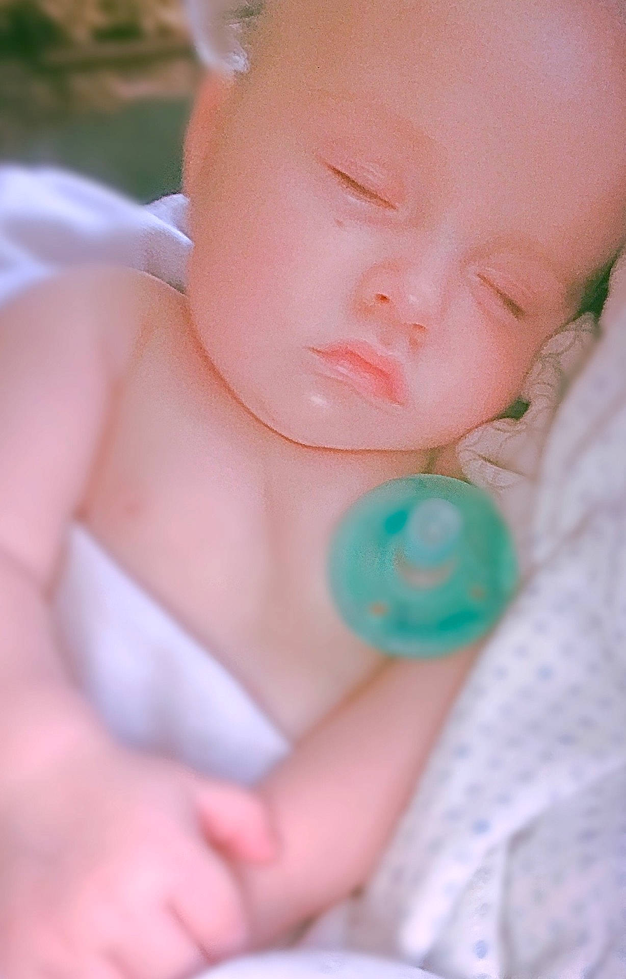 Stephen is registered to the contest to win money with this photo: cheek, child, close_up, eye, face, girl, hand, infant, lip, mouth, person, skin, sleep, toddler