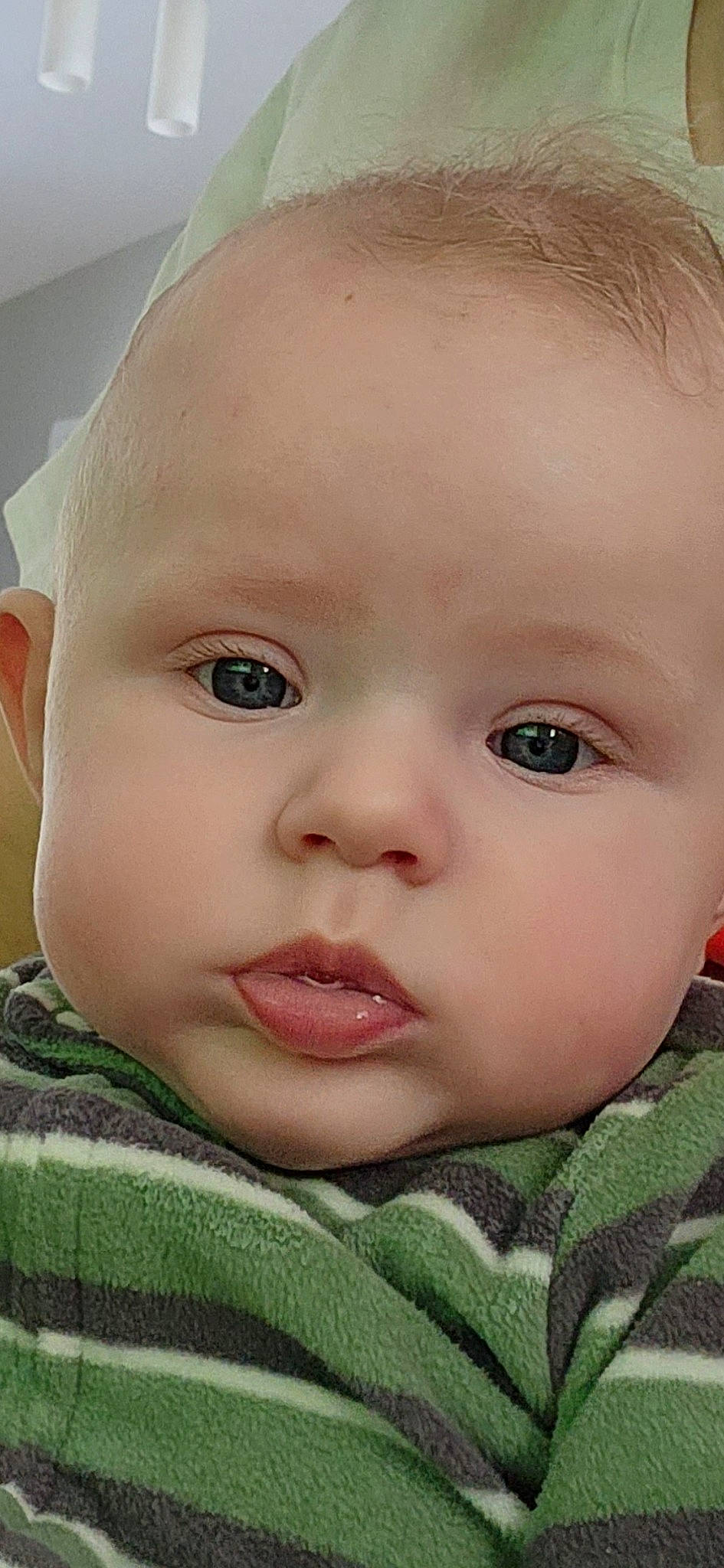 Cayden joined the competition — help win amazing prizes! baby, baby_toddler_clothing, cheek, child, chin, ear, eye, eyebrow, eyelash, forehead, grass, head, iris, lip, mouth, no_expression, nose, person, skin, sleeve