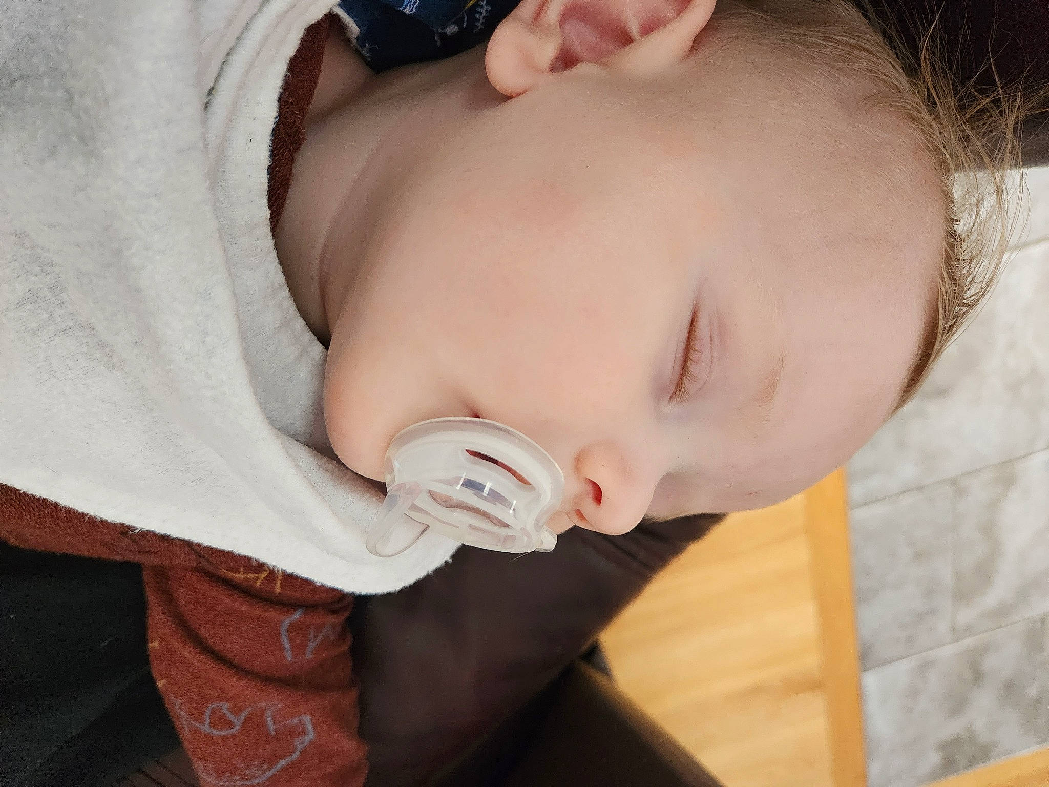 Cayden is registered to the contest to win money with this photo: arm, baby, baby_toddler_clothing, cheek, chin, comfort, ear, eye, eyebrow, eyelash, finger, gesture, headgear, human_body, lip, mouth, neck, nose, person, skin
