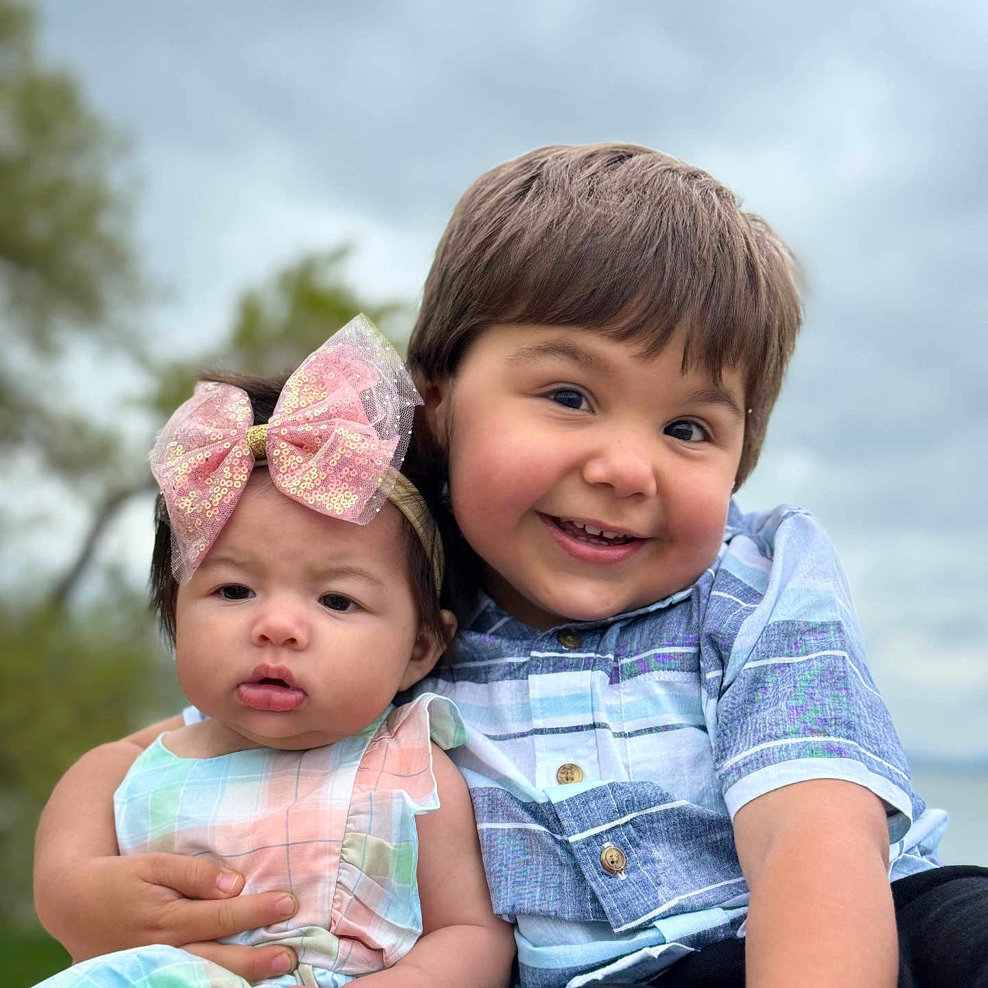 Lexi joined the competition — help win amazing prizes! bodypart, boy, child, clothing, dress, face, finger, hand, happy, hat, head, jeans, male, pants, people, person, photography, portrait, sitting, smile