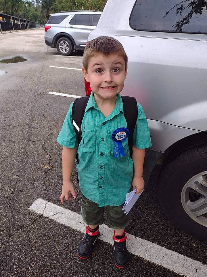 Aiden joined the competition — help win amazing prizes! arm, asphalt, automotive_exterior, automotive_lighting, automotive_tire, bumper, car, face, fender, hand, joy, mammal, motor_vehicle, person, shorts, smile, style, t_shirt, tire, vehicle