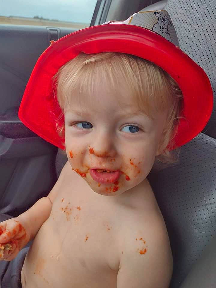 Lincoln is registered to the contest to win money with this photo: baby, cap, cheek, costume_hat, eye, eyebrow, fun, hairstyle, happy, hat, lip, mouth, neck, nose, person, pink, product, skin, smile, sun_hat