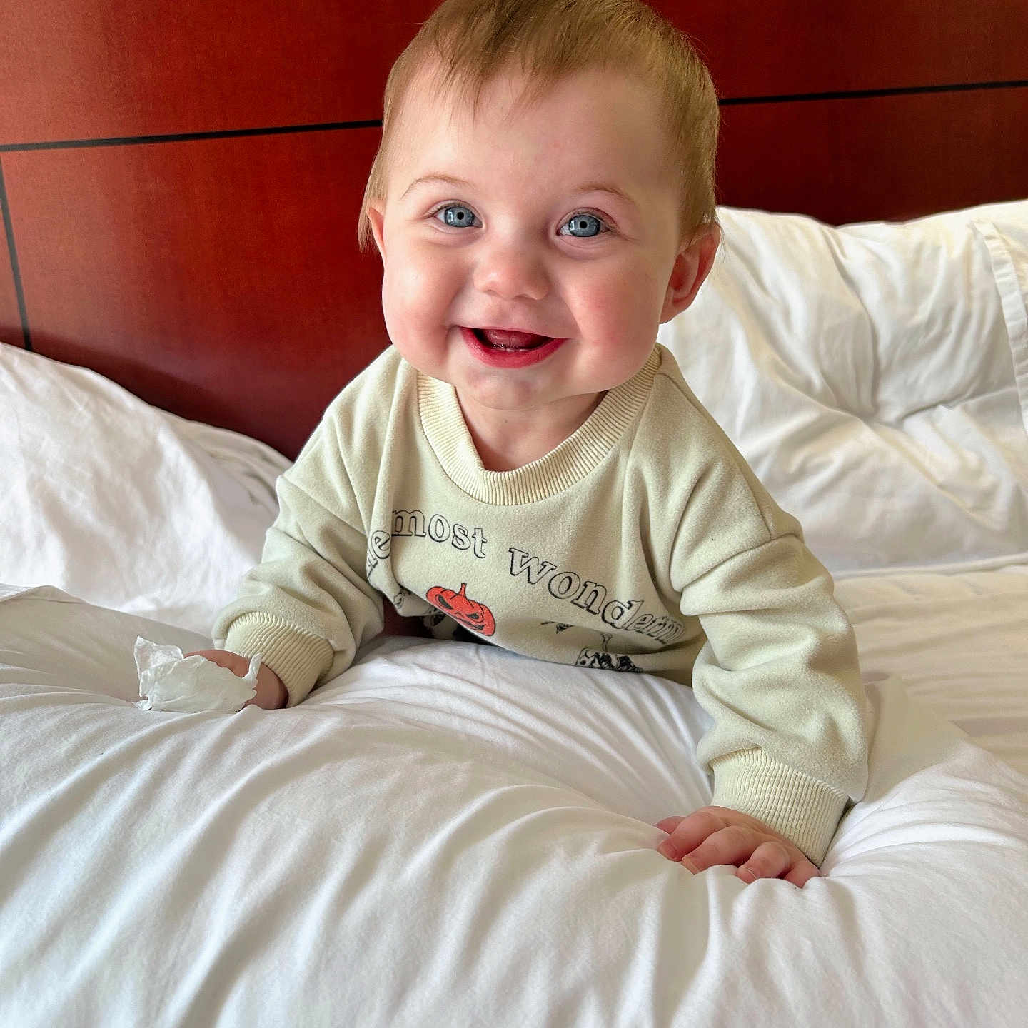 Harlee is registered to the contest to win money with this photo: baby, bed, bedroom, blanket, clothing, couch, cushion, face, furniture, happy, head, homedecor, indoors, person, photography, portrait, room, sitting, smile, t_shirt