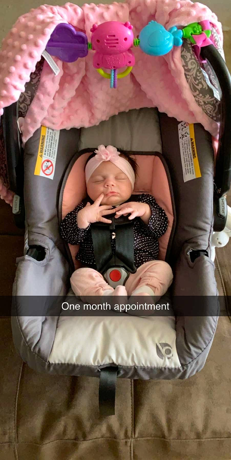 Lilianna is registered to the contest to win money with this photo: baby, baby_carriage, baby_carrier, baby_in_car_seat, baby_products, car_seat, child, comfort, headwear, person, product, toddler