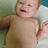 Oaklynn joined the competition — help win amazing prizes! baby, infant, smile, diaper, lying_down, happy, face, skin, hair, cute, child, newborn, body, expression, indoor, person, healthcare, soft_surface, young, closeup