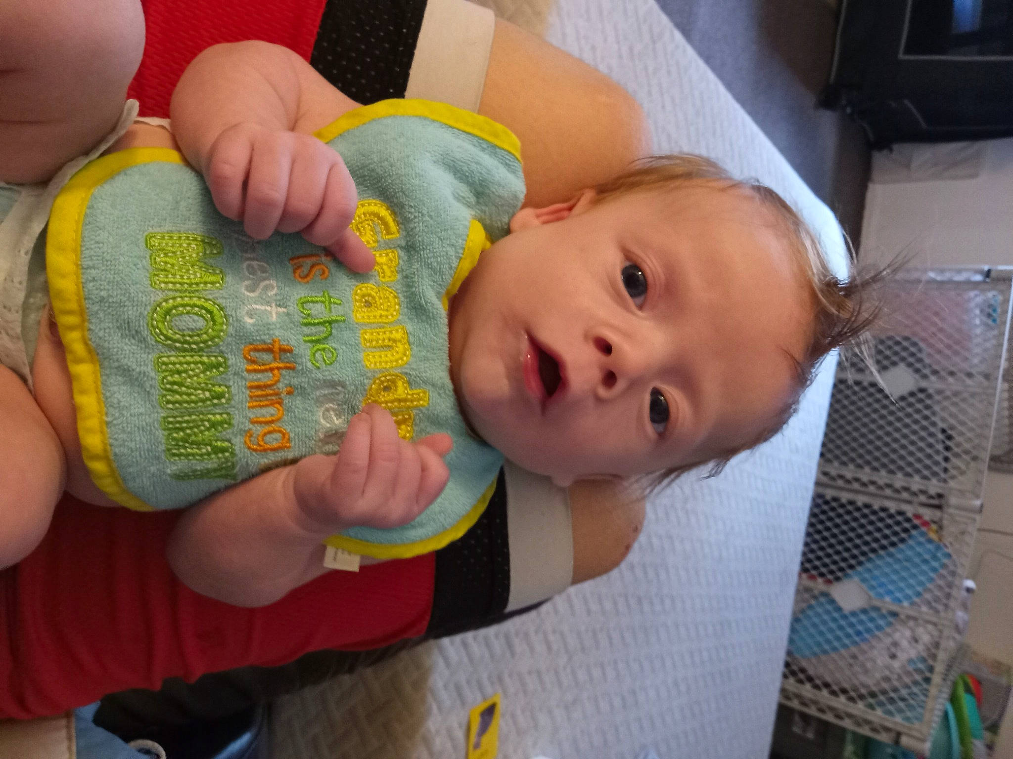 Phoenix is registered to the contest to win money with this photo: baby, baby_products, baby_toddler_clothing, cheek, child, comfort, finger, gesture, happy, nail, nose, pattern, person, room, skin, thumb, toddler, wrist