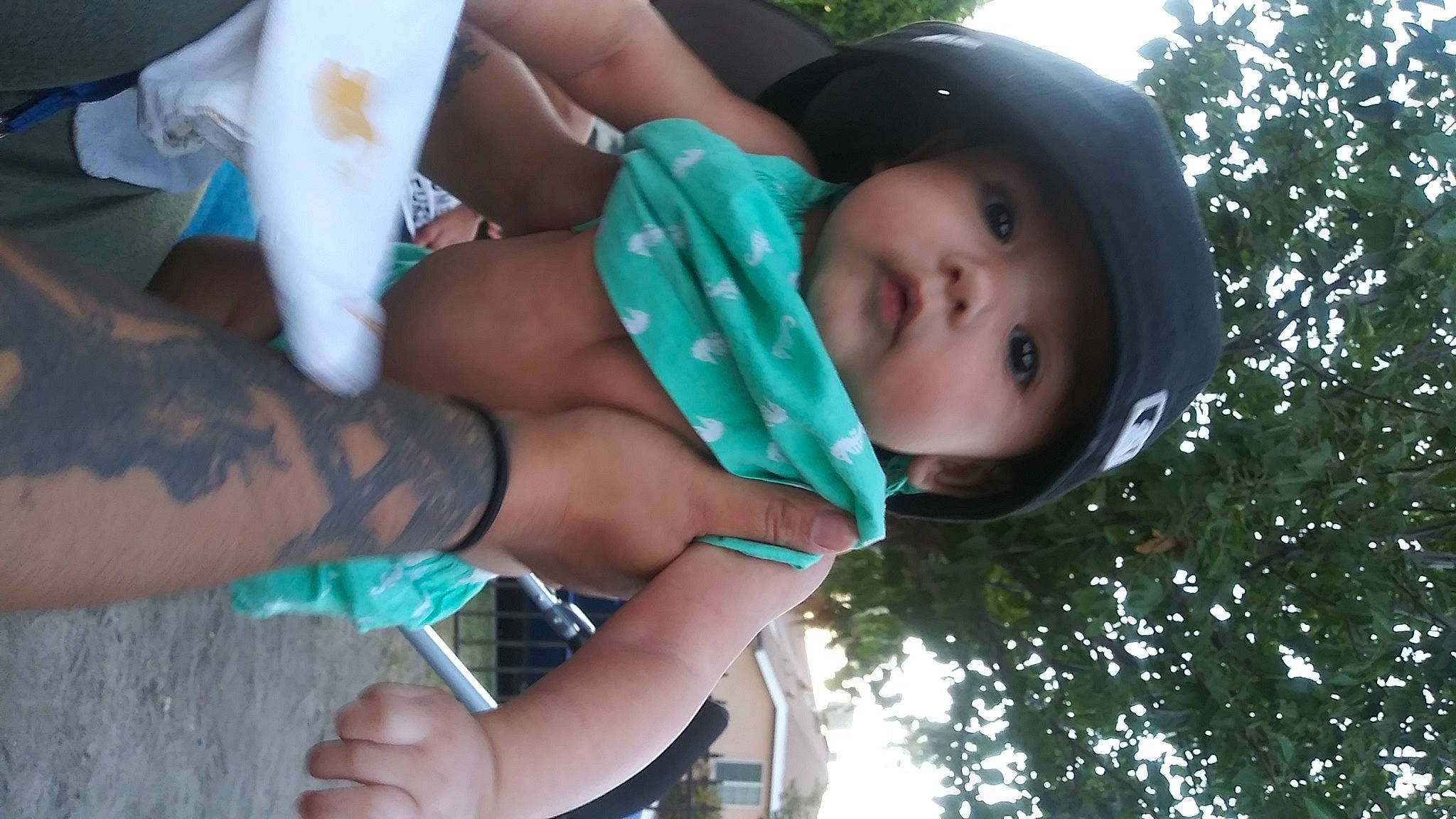 Julissa is registered to the contest to win money with this photo: baby, black_hair, child, headwear, leg, person, toddler