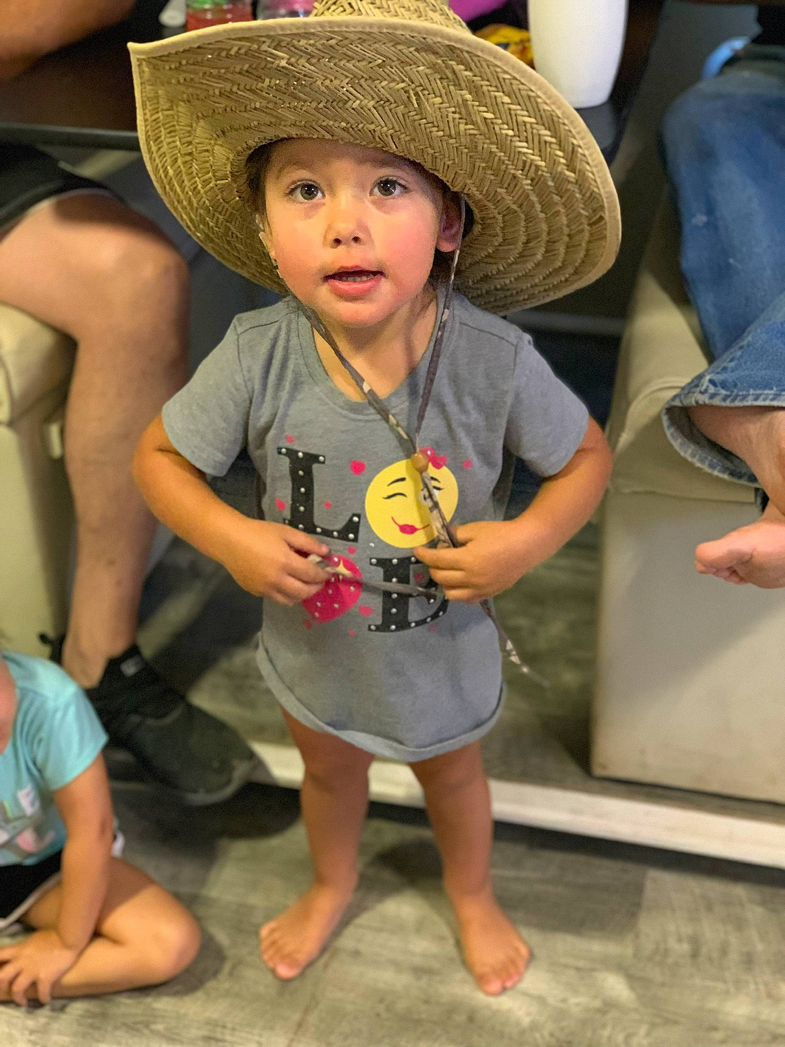 Alayna joined the competition — help win amazing prizes! barefoot, child, fashion_accessory, fun, hat, headgear, headwear, leg, person, sombrero, sun_hat, toddler