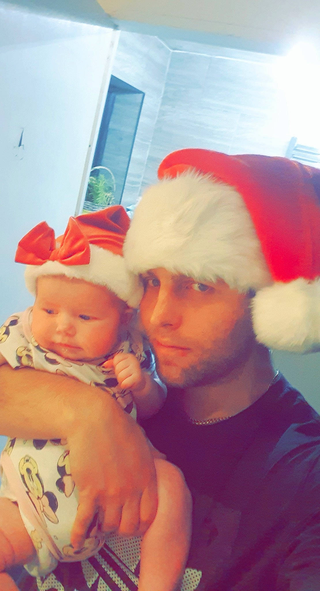 Leona is registered to the contest to win money with this photo: abdomen, baby, baby_toddler_clothing, bracelet, cheek, child, christmas, costume, costume_accessory, costume_hat, flesh, fur_clothing, headwear, holiday, human, love, nail, person, t_shirt, toddler