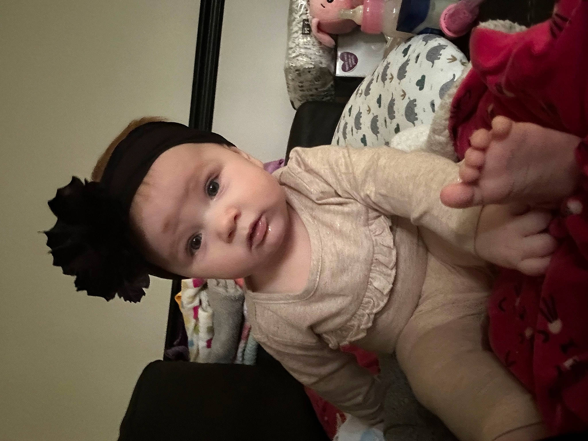 Harlow is registered to the contest to win money with this photo: baby, cheek, child, comfort, eyelash, flash_photography, fun, fur, gesture, happy, mouth, nose, person, room, sitting, skin, thumb, toddler, tree