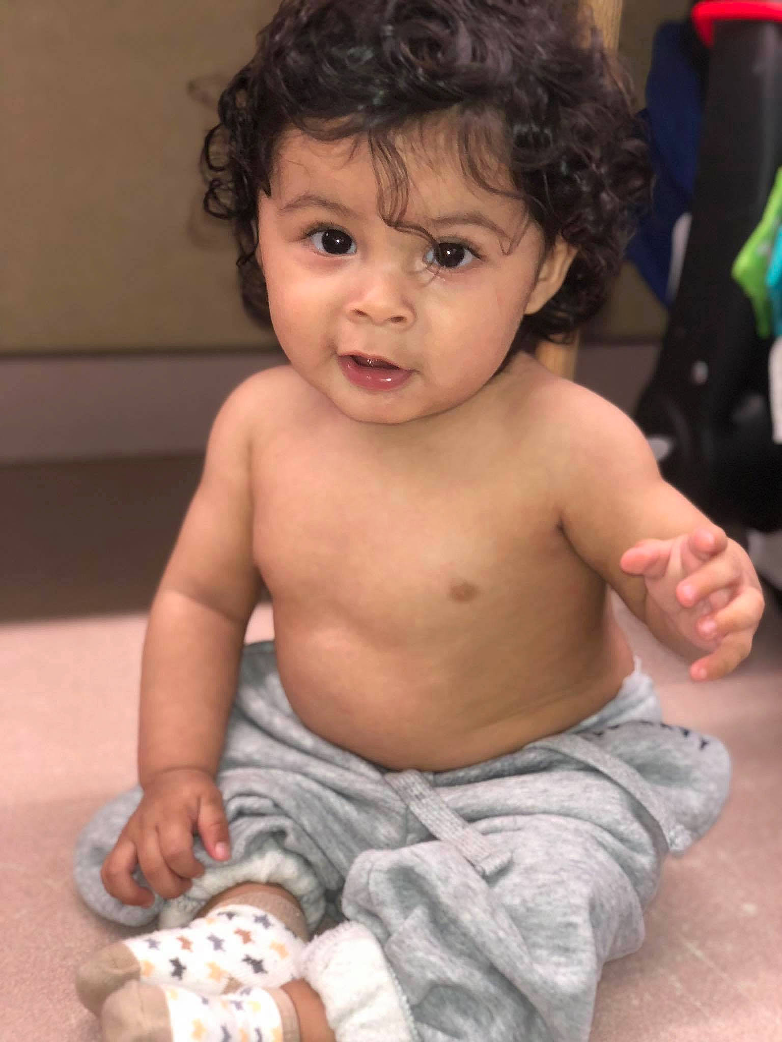 Davis is registered to the contest to win money with this photo: barechestedness, boy, cheek, child, chin, infant, person, toddler