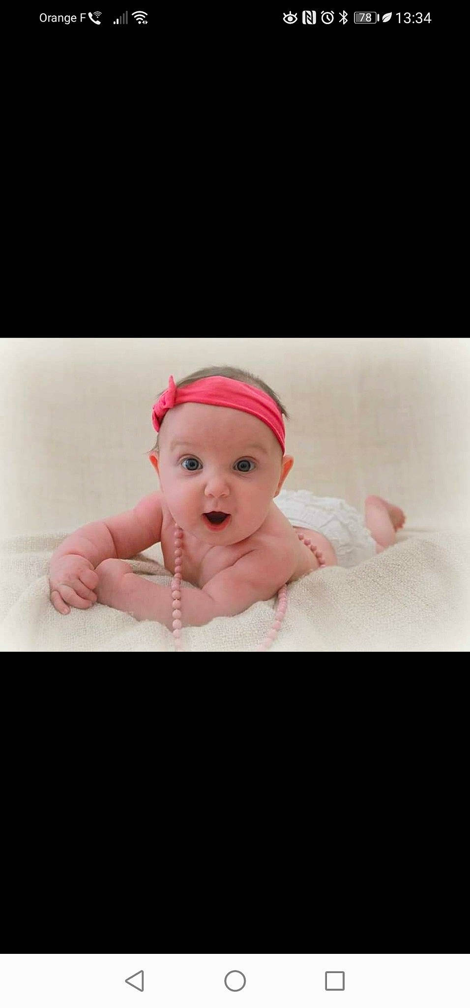 Camille a rejoint le concours — aidez-le/la à gagner de superbes lots ! art, baby, baby_toddler_clothing, beanie, cap, cheek, comfort, fashion_accessory, flash_photography, fur, happy, headgear, headwear, magenta, person, pink, portrait, portrait_photography, sitting, sleeve