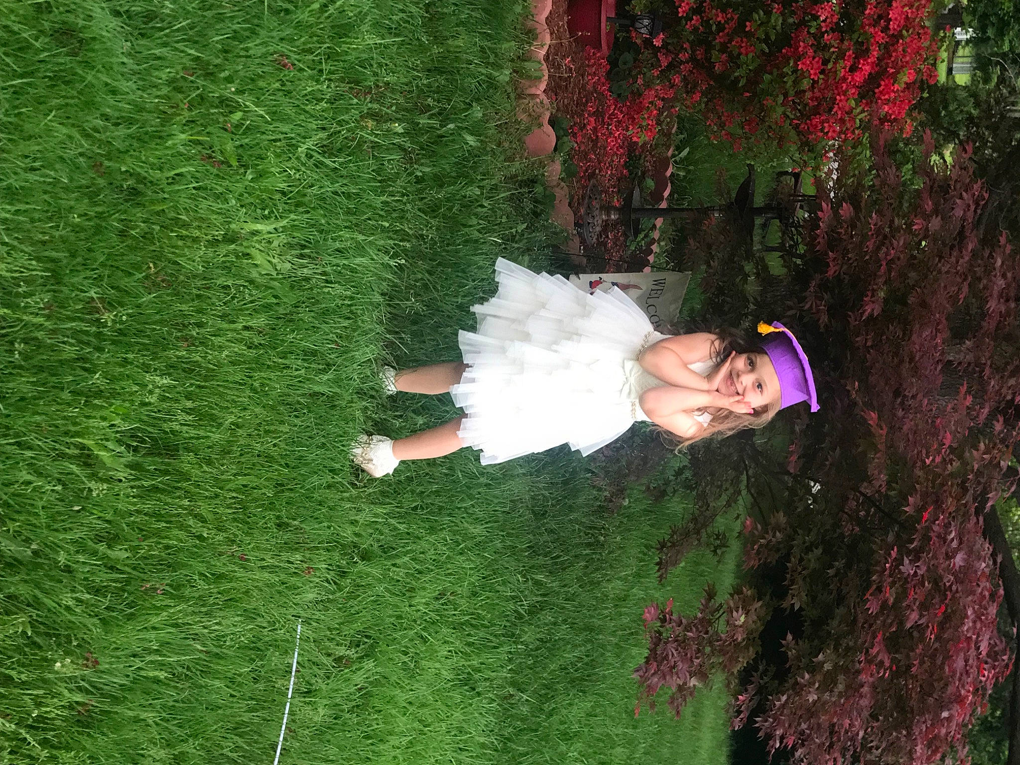 Khloee joined the competition — help win amazing prizes! formal_wear, fun, garden, grass, grass_family, green, happy, headwear, hedge, joy, landscape, lawn, leisure, magenta, natural_environment, people_in_nature, person, plant, shrub, terrestrial_plant