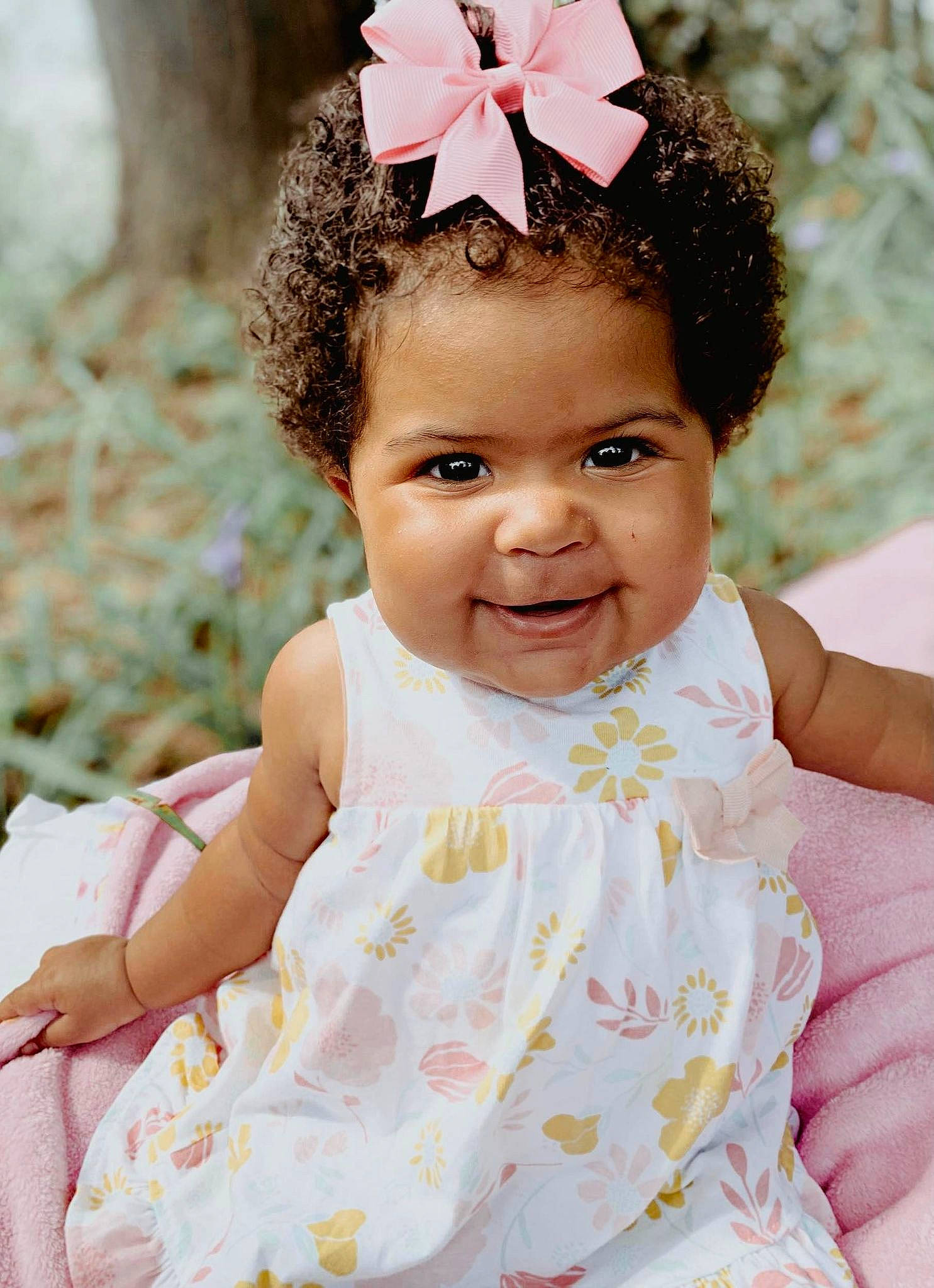 Leila is registered to the contest to win money with this photo: baby_toddler_clothing, beauty, dress, face, facial_expression, flash_photography, green, hairstyle, happy, head, headgear, headpiece, magenta, person, photograph, pink, skin, smile, summer, toddler