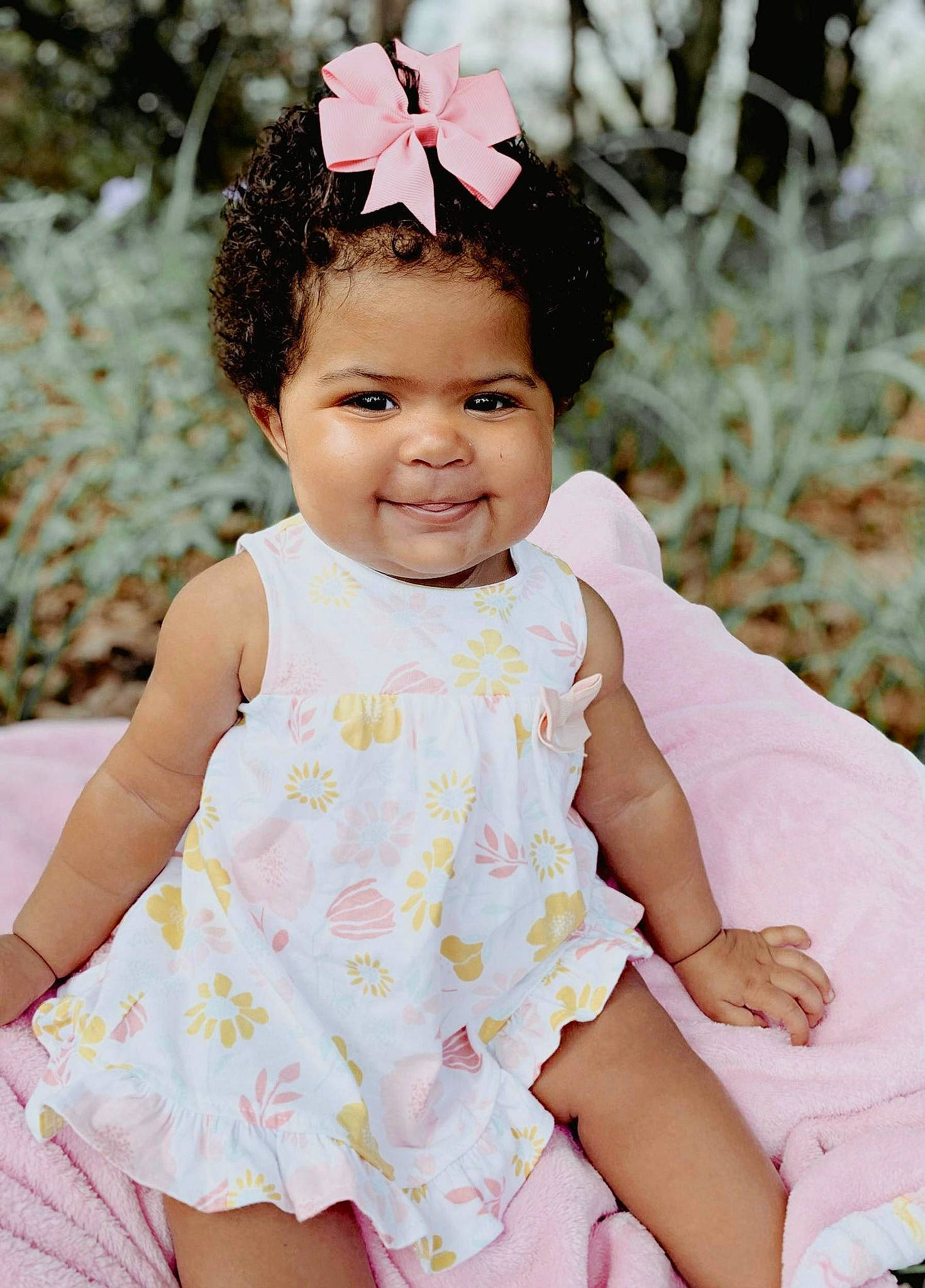 Leila joined the competition — help win amazing prizes! baby, baby_toddler_clothing, child, day_dress, dress, face, fashion_accessory, flash_photography, grass, happy, joy, magenta, pattern, person, pink, plant, skin, sleeve, smile, spring