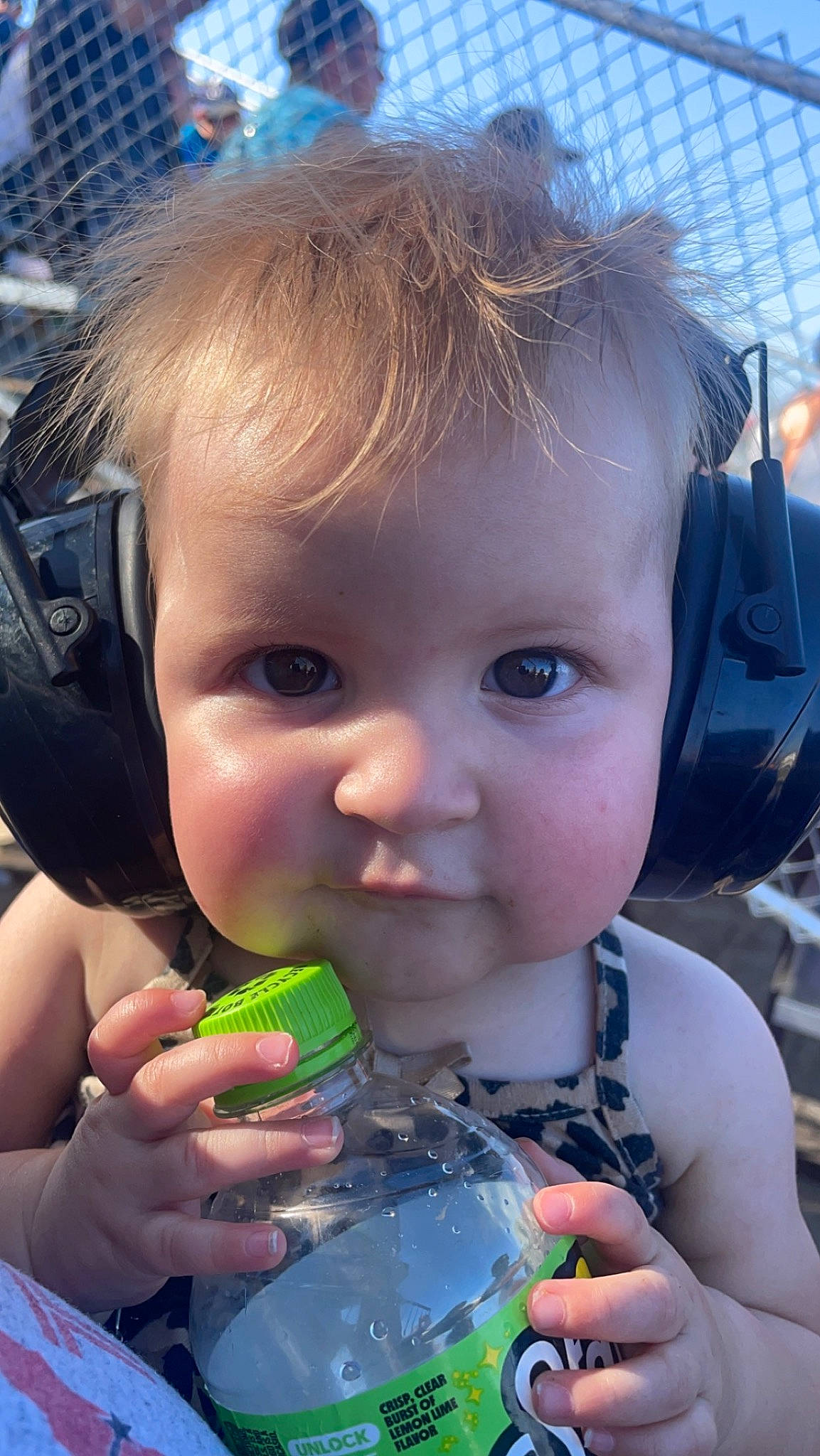 Esme is registered to the contest to win money with this photo: blue, cheek, cool, drinkware, ear, eye, finger, fun, hairstyle, hand, happy, iris, lip, mouth, nose, organ, person, product, skin, smile