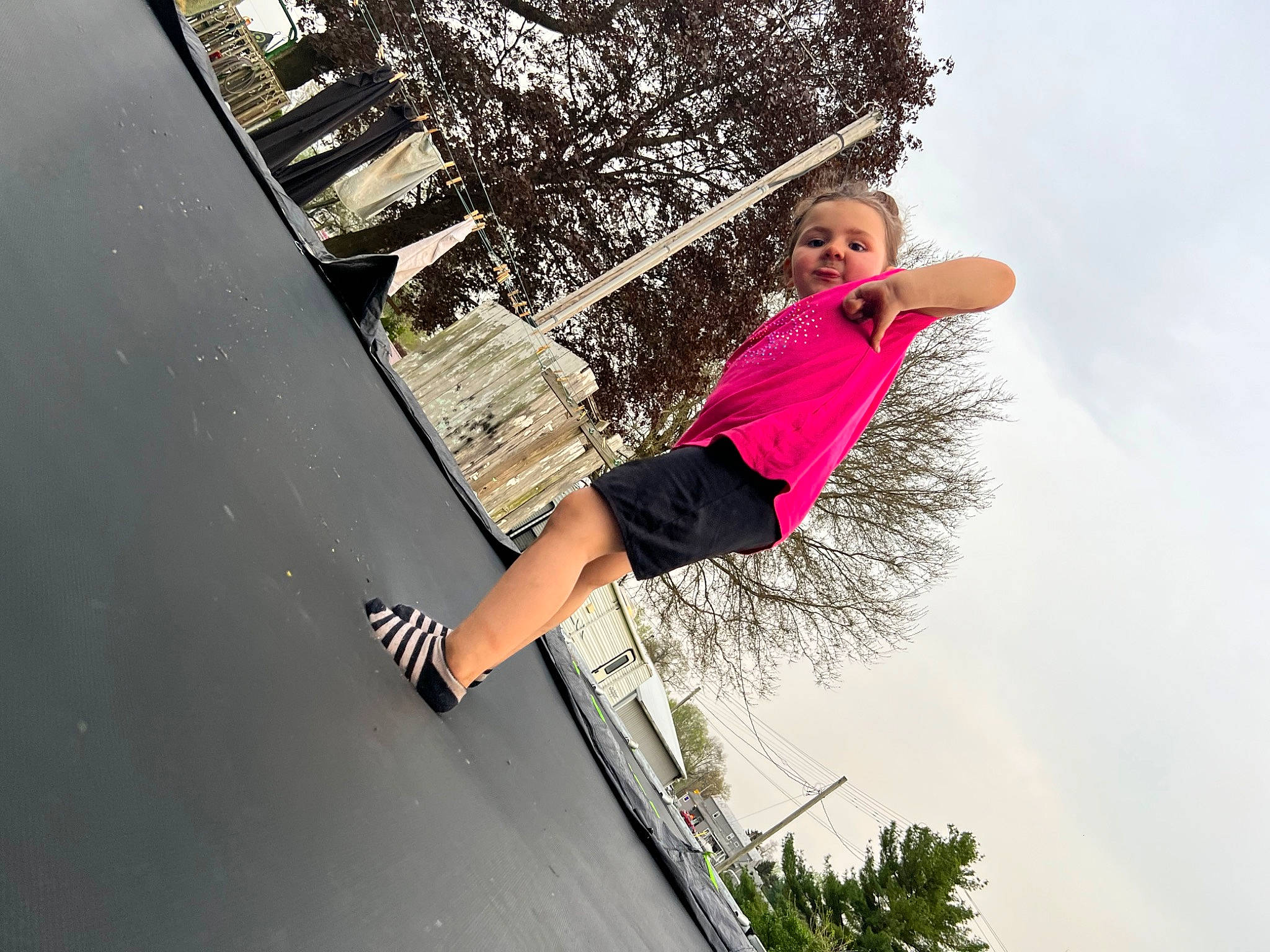 Madalynn is registered to the contest to win money with this photo: adventure, extreme_sport, eyewear, flash_photography, fun, happy, human_leg, jumping, leisure, people_in_nature, person, plant, recreation, shorts, sky, street_fashion, street_stunts, t_shirt, thigh, tree