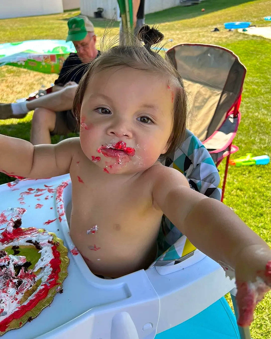 Declyn is registered to the contest to win money with this photo: baby, birthday, chair, chest, child, dessert, event, fruit, fun, grass, green, happy, headwear, icing, leisure, person, play, recreation, summer, tableware
