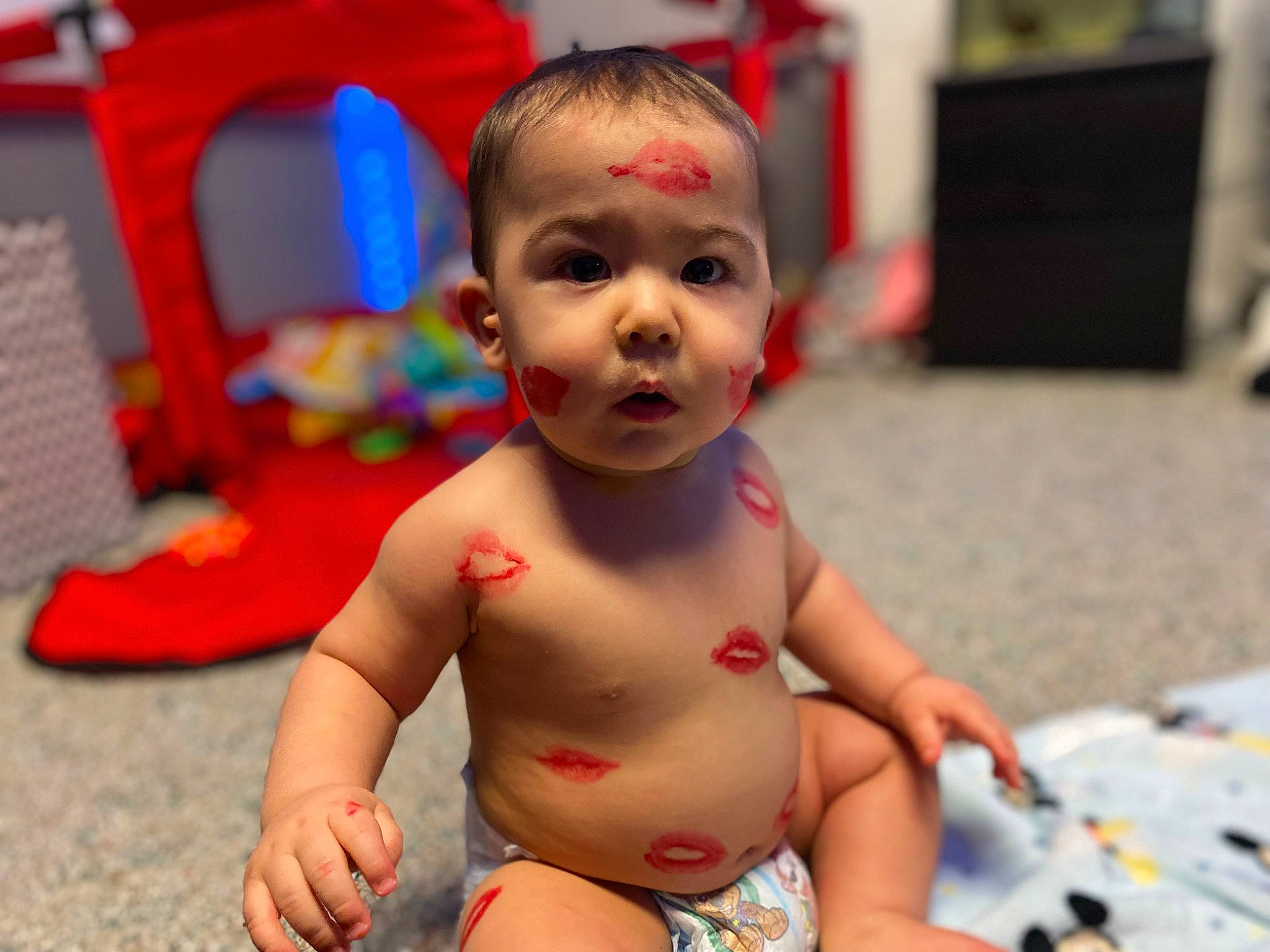 Kingsley is registered to the contest to win money with this photo: abdomen, baby, baby_playing_with_toys, cheek, chest, child, eye, fun, happy, head, leisure, mouth, people, person, red, skin, smile, summer, thigh, toddler