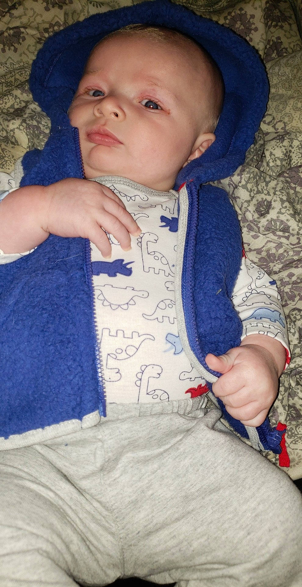 Lochlan joined the competition — help win amazing prizes! baby, baby_toddler_clothing, blue, cheek, child, chin, cool, eye, face, forehead, head, lip, nose, outerwear, person, sitting, skin, smile, toddler