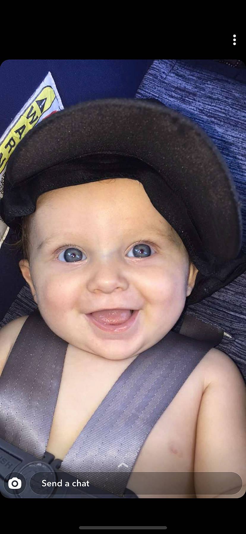 Boston is registered to the contest to win money with this photo: cap, cheek, child, chin, eyebrow, face, fashion_accessory, forehead, hat, head, headgear, headwear, joy, lip, nose, person, portrait_photography, skin, smile, sun_hat
