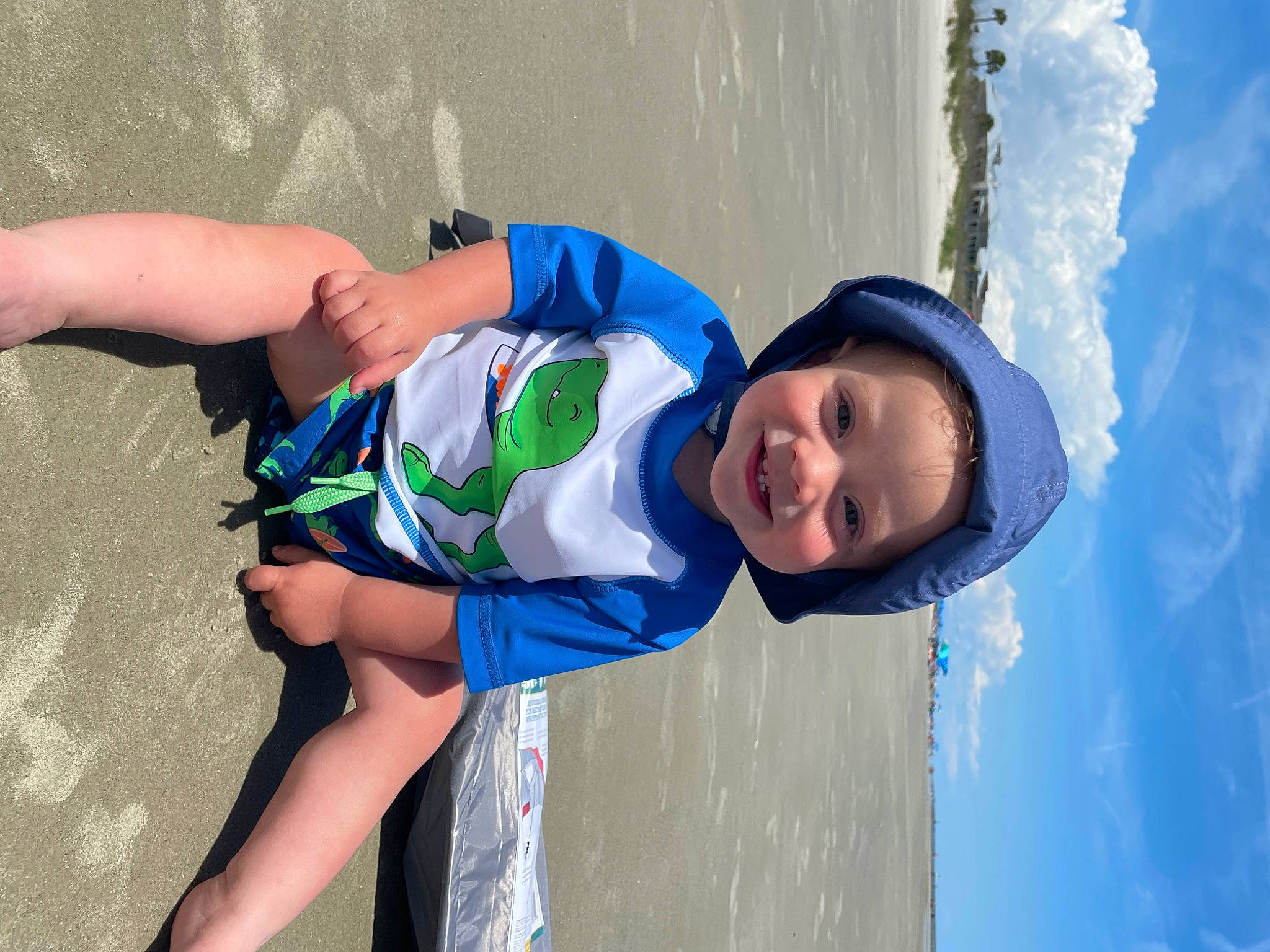 Tucker joined the competition — help win amazing prizes! arm, azure, barefoot, body_of_water, elbow, electric_blue, face, fun, happy, headwear, joy, knee, leg, leisure, people_in_nature, person, recreation, shorts, sky, smile
