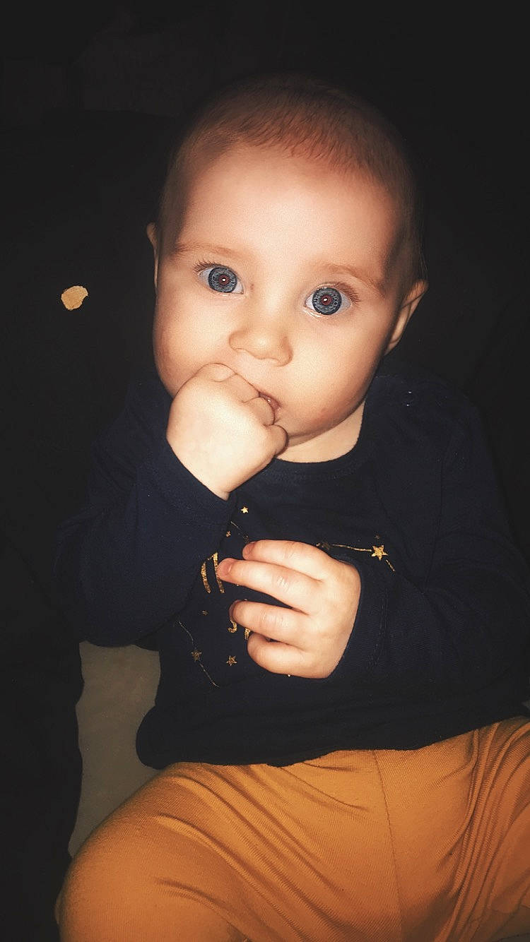 Evie-rose is registered to the contest to win money with this photo: baby, cheek, child, chin, ear, eye, eyebrow, face, finger, forehead, head, lip, mouth, neck, nose, person, photography, portrait, skin, smile