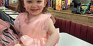 Alayah Raiyn is registered to the contest to win money with this photo: arcade, arcade_machines, celebration, chair, child, clothing, dress, entertainment, fun, girl, happy, indoor, light, people, person, portrait, princess, smiling, table, tiara