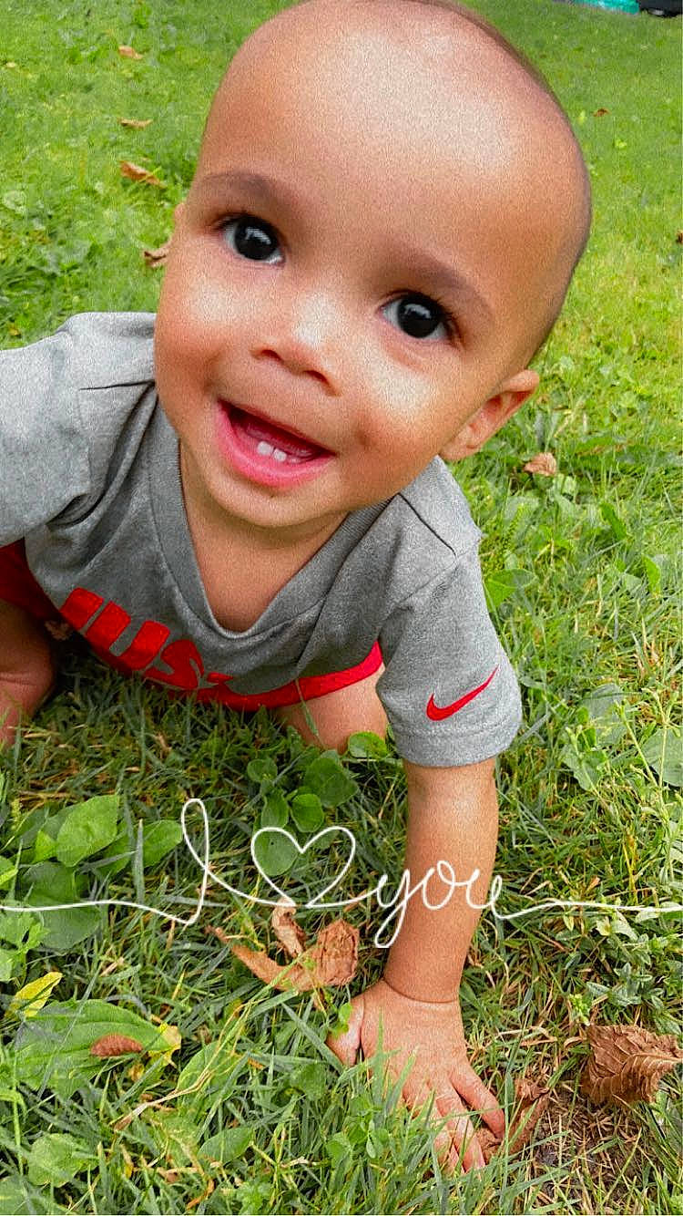 Dakari joined the competition — help win amazing prizes! baby_toddler_clothing, dress, eye, finger, fun, grass, grass_family, green, happy, joy, lip, mammal, mouth, nose, people_in_nature, person, photograph, plant, skin, smile