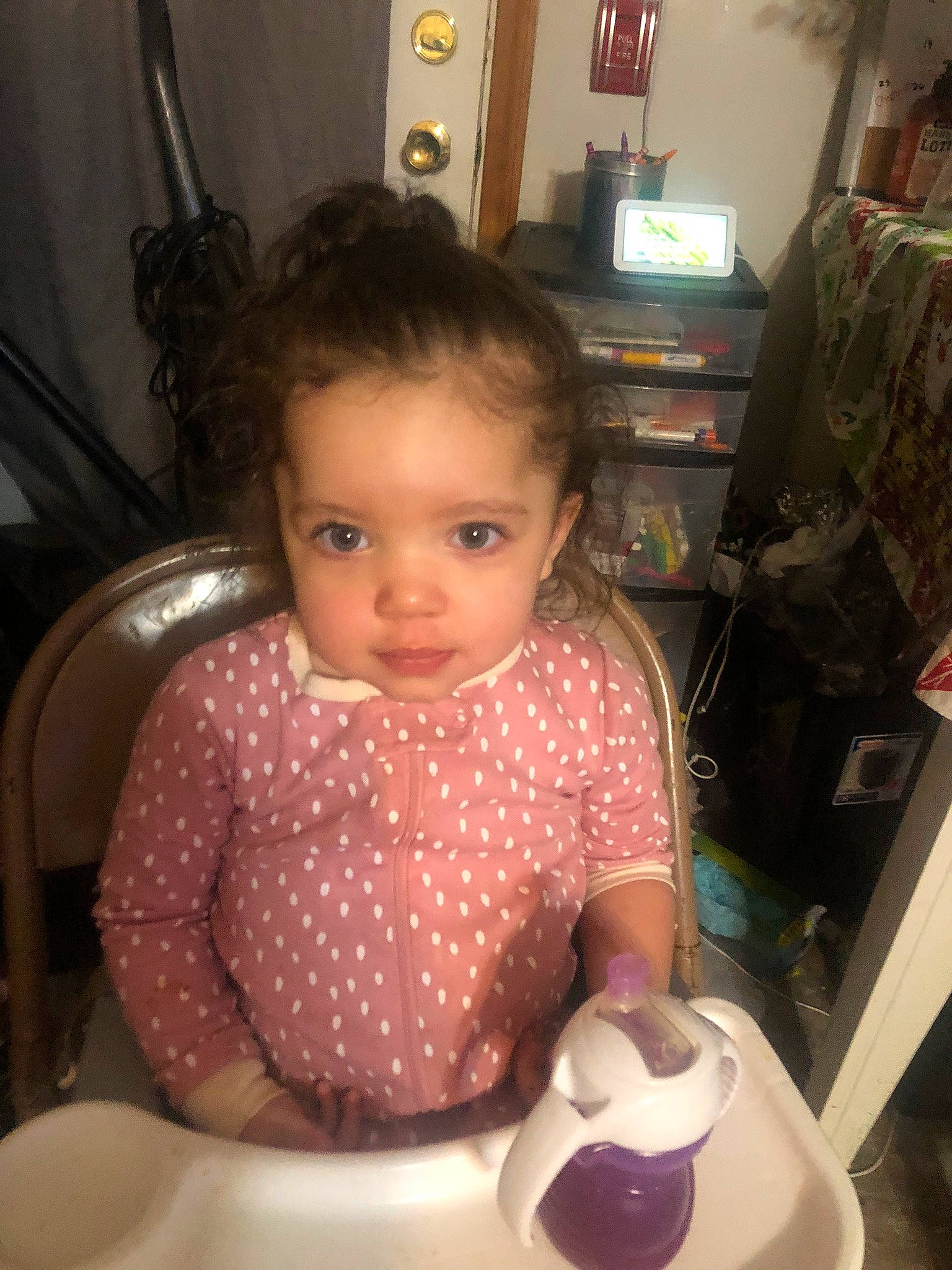 Ava is registered to the contest to win money with this photo: baby, baby_products, baby_toddler_clothing, bookcase, box, chair, cheek, child, drawer, fun, happy, iris, person, room, shelf, shelving, sitting, skin, thumb, toddler