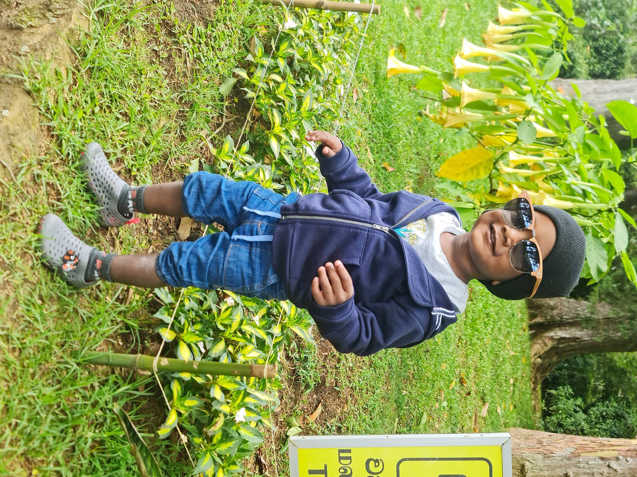 Binev joined the competition — help win amazing prizes! flowering_plant, fun, grass, grassland, groundcover, happy, headwear, human_leg, joy, leisure, people_in_nature, person, plant, recreation, shorts, shrub, sitting, smile, t_shirt, travel