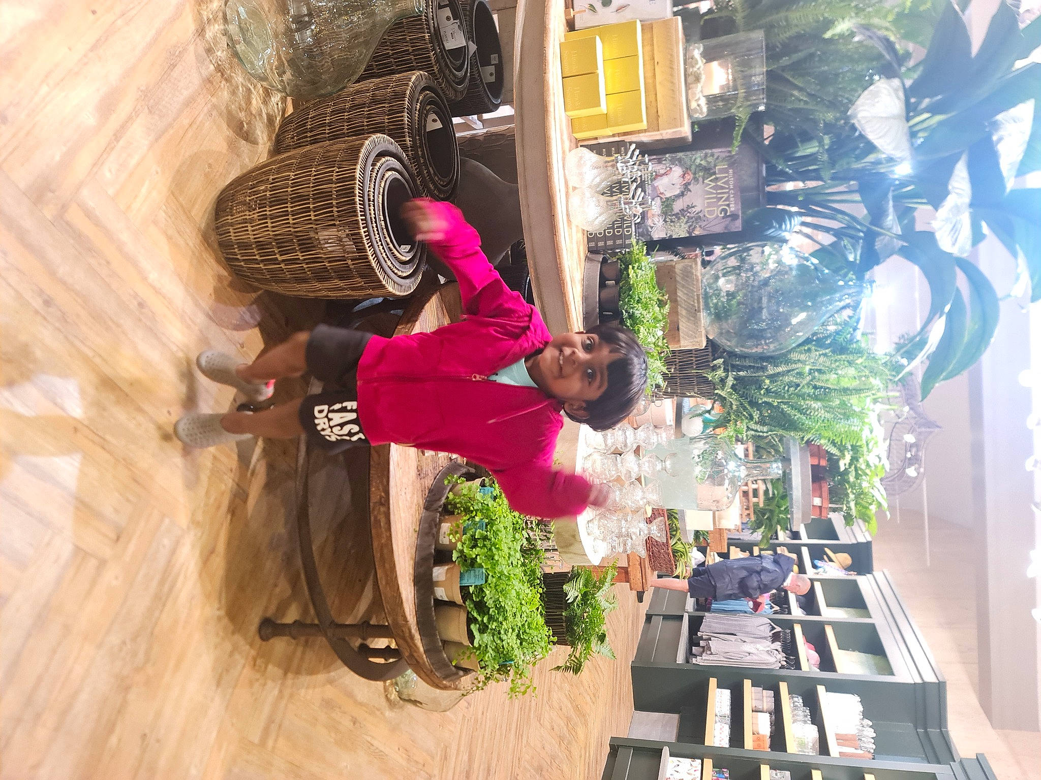 Binev is registered to the contest to win money with this photo: city, facade, flooring, fun, hardwood, hat, joy, leisure, mixed_use, person, plant, room, sunglasses, tourism, tree, urban_design, visual_arts, wood, wood_flooring