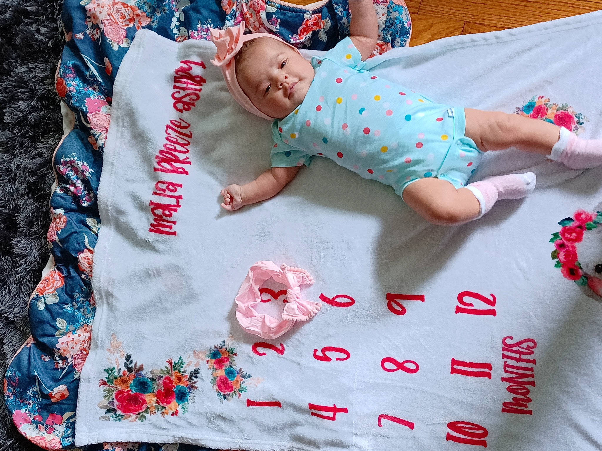 Malia joined the competition — help win amazing prizes! baby, baby_toddler_clothing, carmine, child, comfort, design, font, green, happy, linens, pattern, person, pink, product, red, sleeve, smile, t_shirt, textile, toddler
