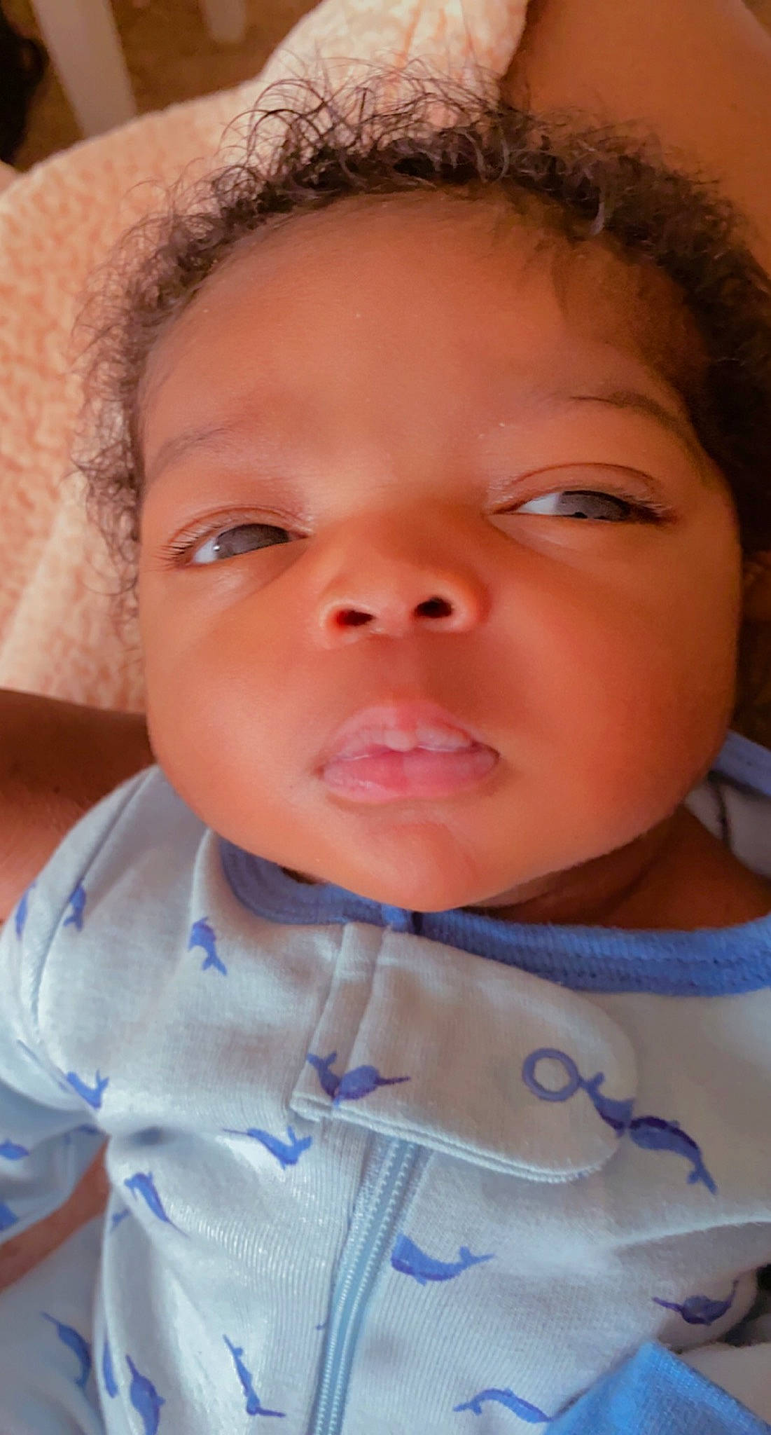 Dakari is registered to the contest to win money with this photo: baby, cheek, chin, ear, eyebrow, eyelash, facial_expression, forehead, hairstyle, happy, iris, jaw, lip, mouth, neck, nose, person, shoulder, skin, sleeve