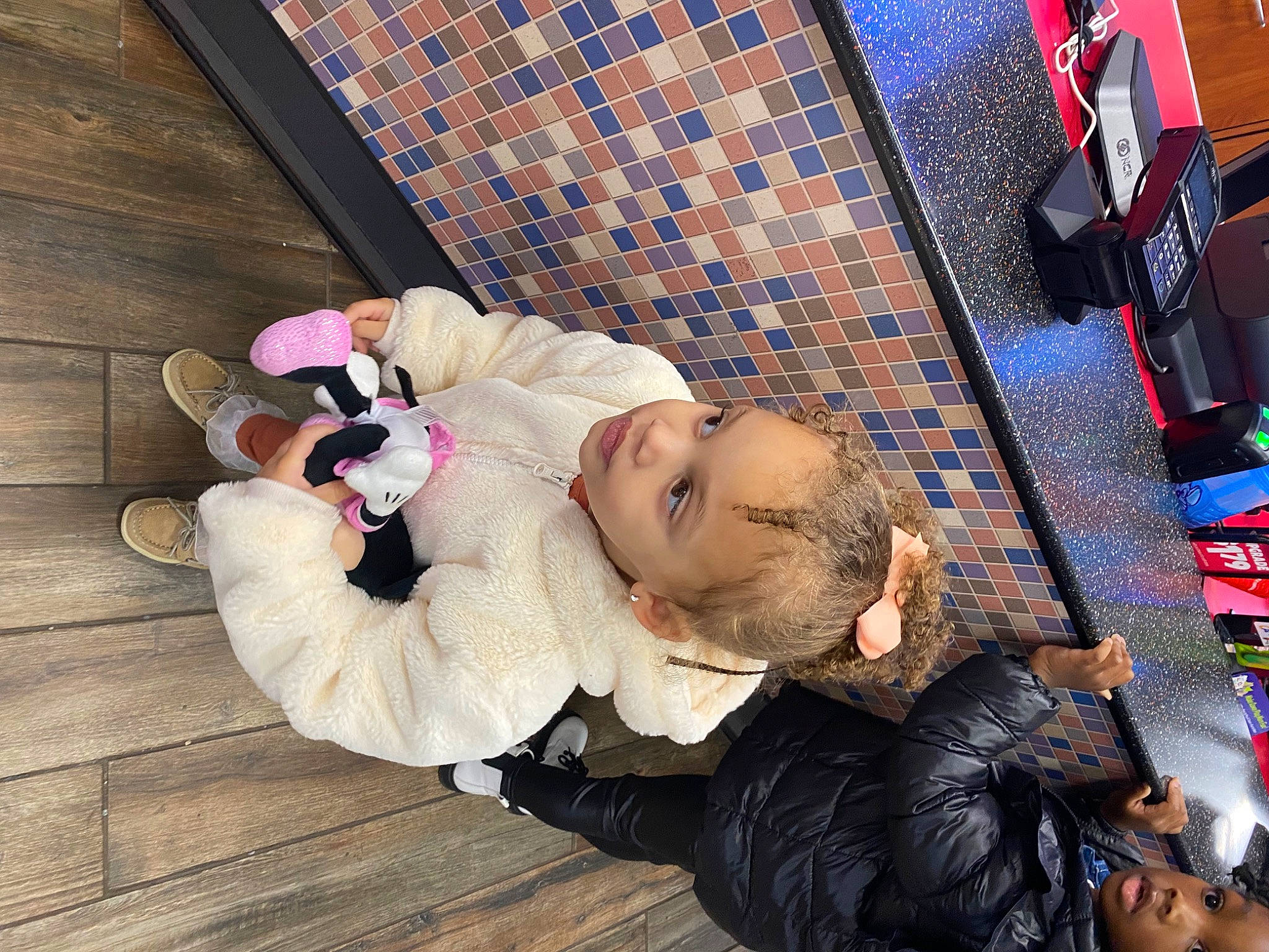 Kyla is registered to the contest to win money with this photo: baby, baby_toddler_clothing, child, comfort, flooring, fun, fur, happy, hardwood, leisure, person, room, sitting, smile, toddler, tree, wood, wood_flooring