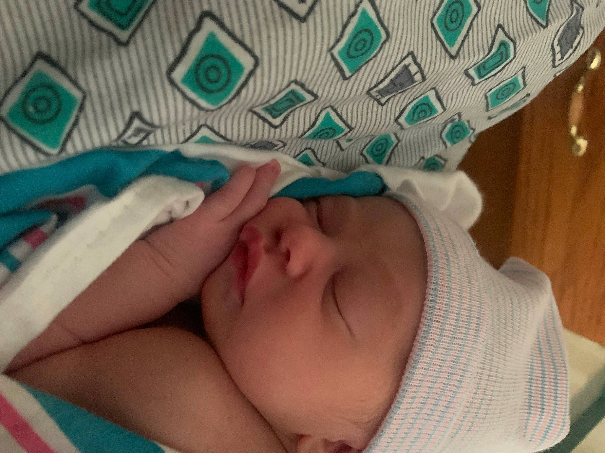 Kayleen is registered to the contest to win money with this photo: baby, baby_sleeping, baby_toddler_clothing, bedtime, cheek, child, comfort, fashion_accessory, finger, headwear, linens, mouth, nail, nap, pattern, person, room, skin, sleep, textile