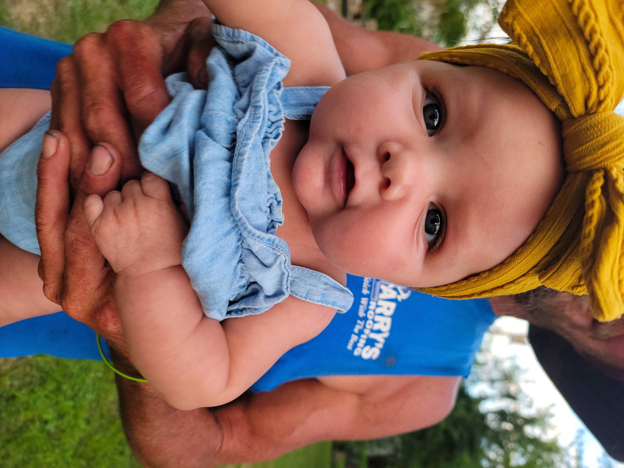 Elsie is registered to the contest to win money with this photo: baby, baby_toddler_clothing, blue, eye, eyelash, finger, fun, grass, hand, happy, leisure, lip, mouth, nose, people_in_nature, person, plant, skin, summer, toddler