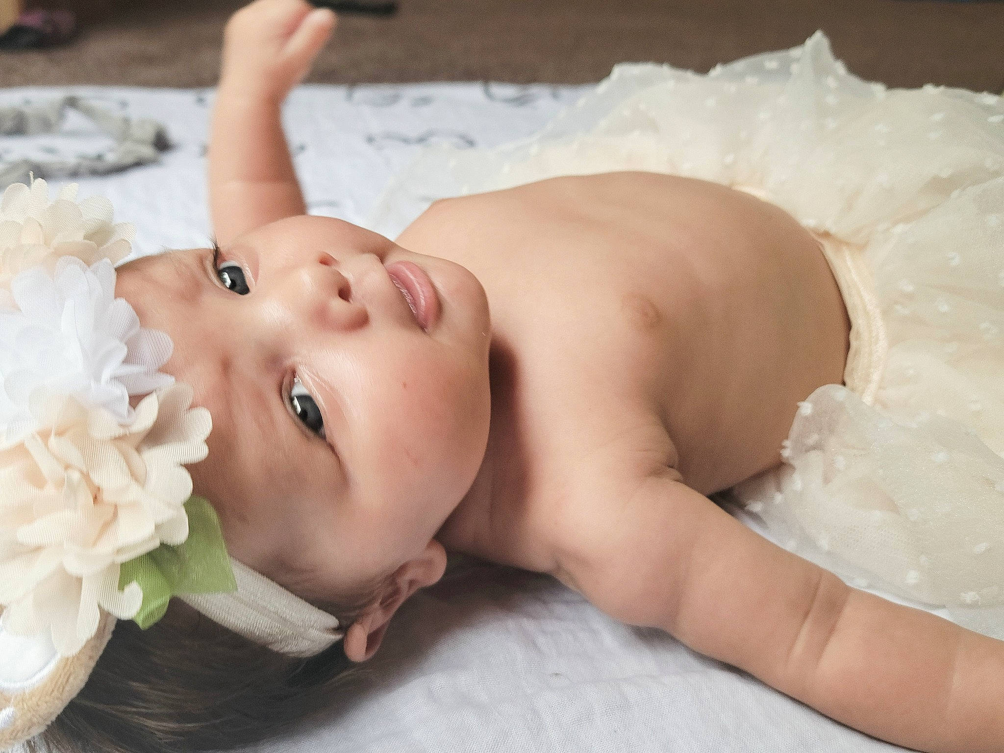Elsie joined the competition — help win amazing prizes! baby, baby_toddler_clothing, dress, eye, eyebrow, eyelash, face, finger, flash_photography, flower, hairstyle, hand, happy, head, headgear, headpiece, headwear, lip, person, skin