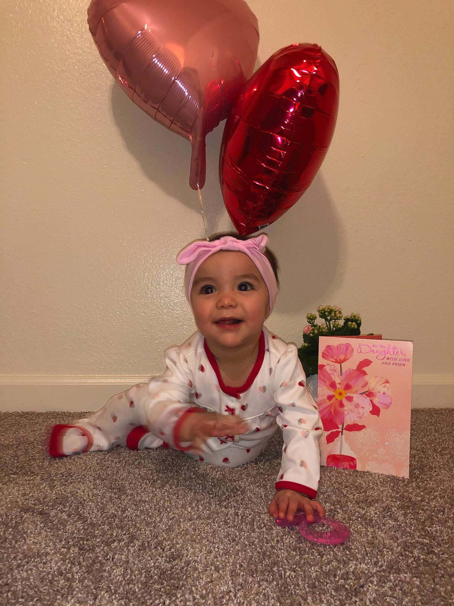 Iyla joined the competition — help win amazing prizes! balloon, child, costume, ear, fun, happy, headwear, joy, outerwear, party_supply, person, pink, red, toddler