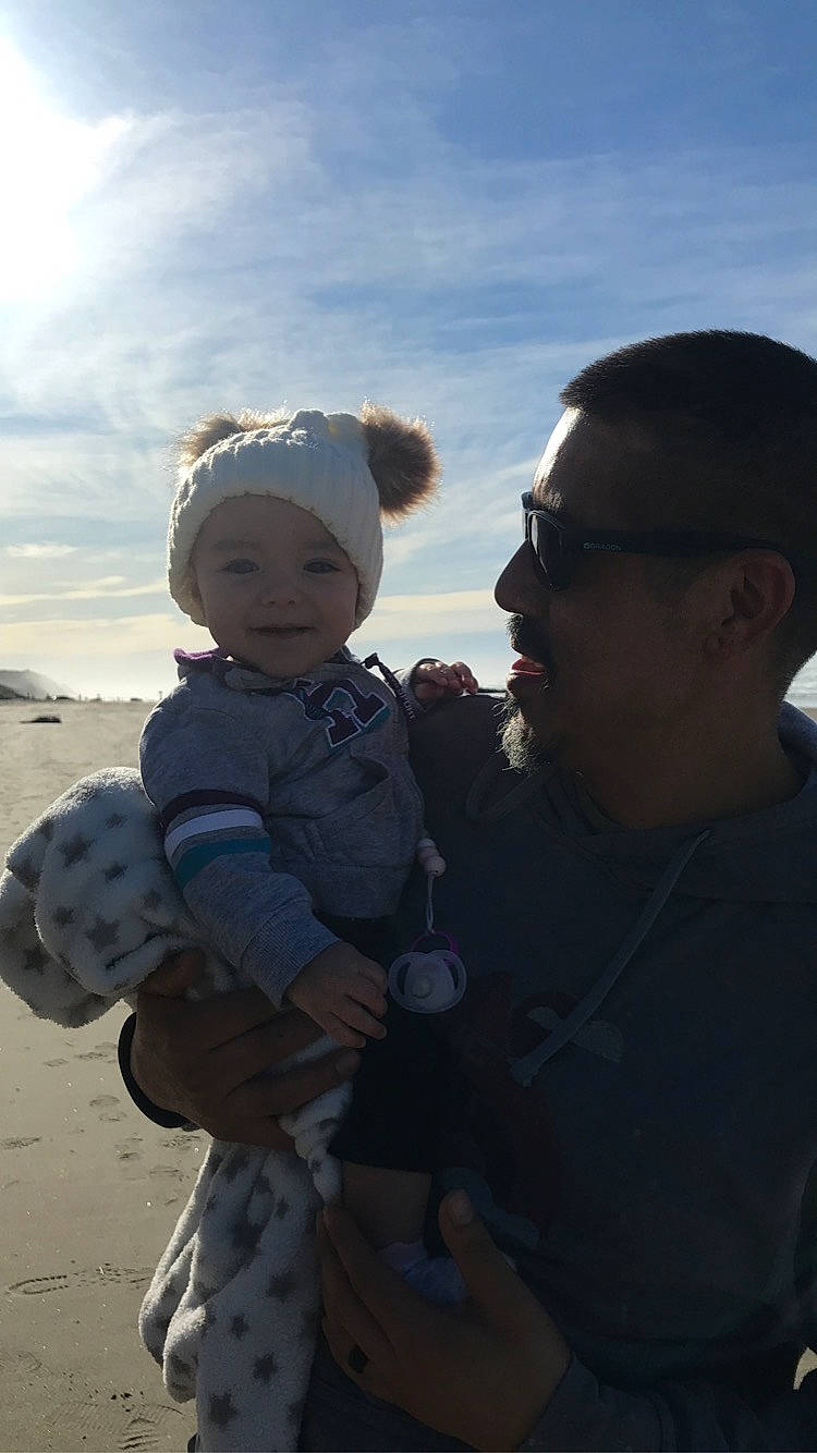 Iyla joined the competition — help win amazing prizes! child, cloud, gesture, headwear, person, sky, smile, toddler, under_exposed, vacation