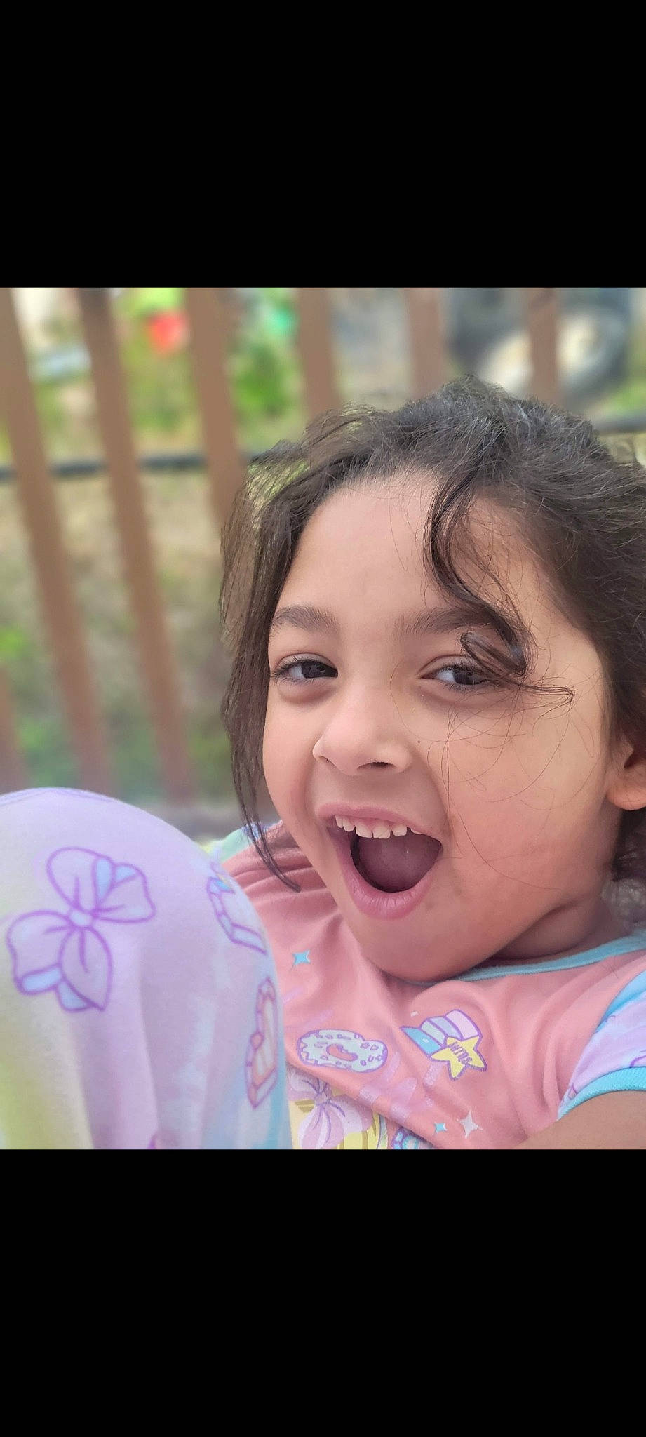 Izzy is registered to the contest to win money with this photo: cheek, child, event, eyelash, fun, gesture, grass, happy, iris, leisure, lip, mouth, nose, people_in_nature, person, pink, recreation, skin, smile, summer