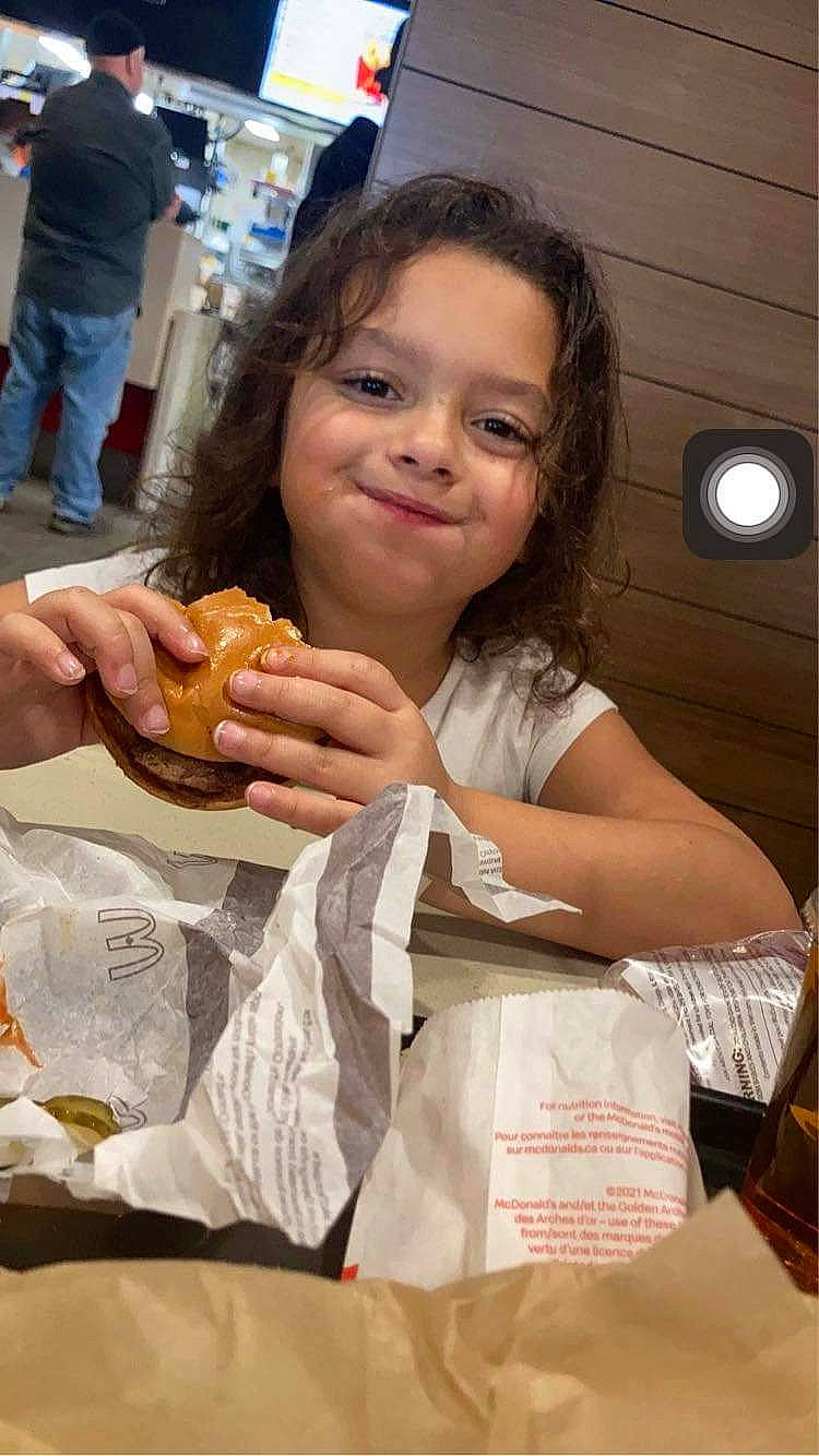 Annabelle is registered to the contest to win money with this photo: baked_goods, bread, breakfast, child, comfort_food, cuisine, dish, eating, fast_food, finger_food, food, food_craving, happy, joy, junk_food, person, sandwich, side_dish, smile, snack