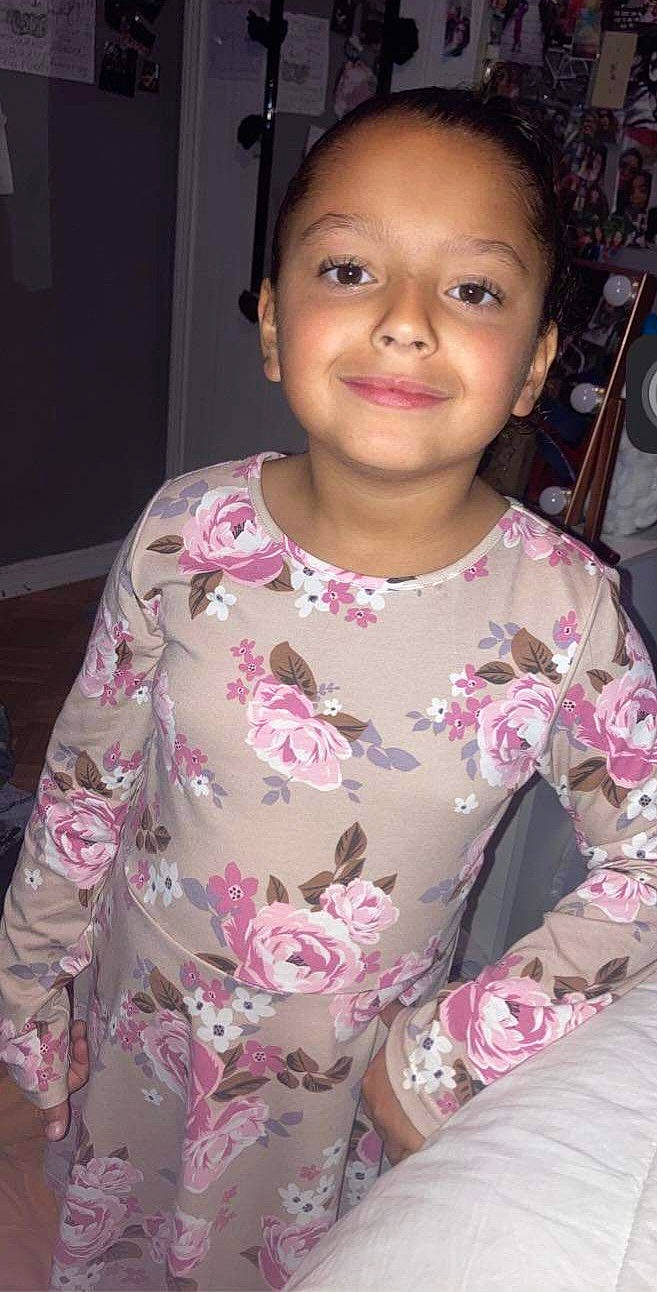 Annabelle is registered to the contest to win money with this photo: baby_toddler_clothing, black_hair, cheek, child, chin, eye, eyebrow, face, forehead, fun, hair, happy, head, iris, joy, nose, person, pink, skin, sleeve