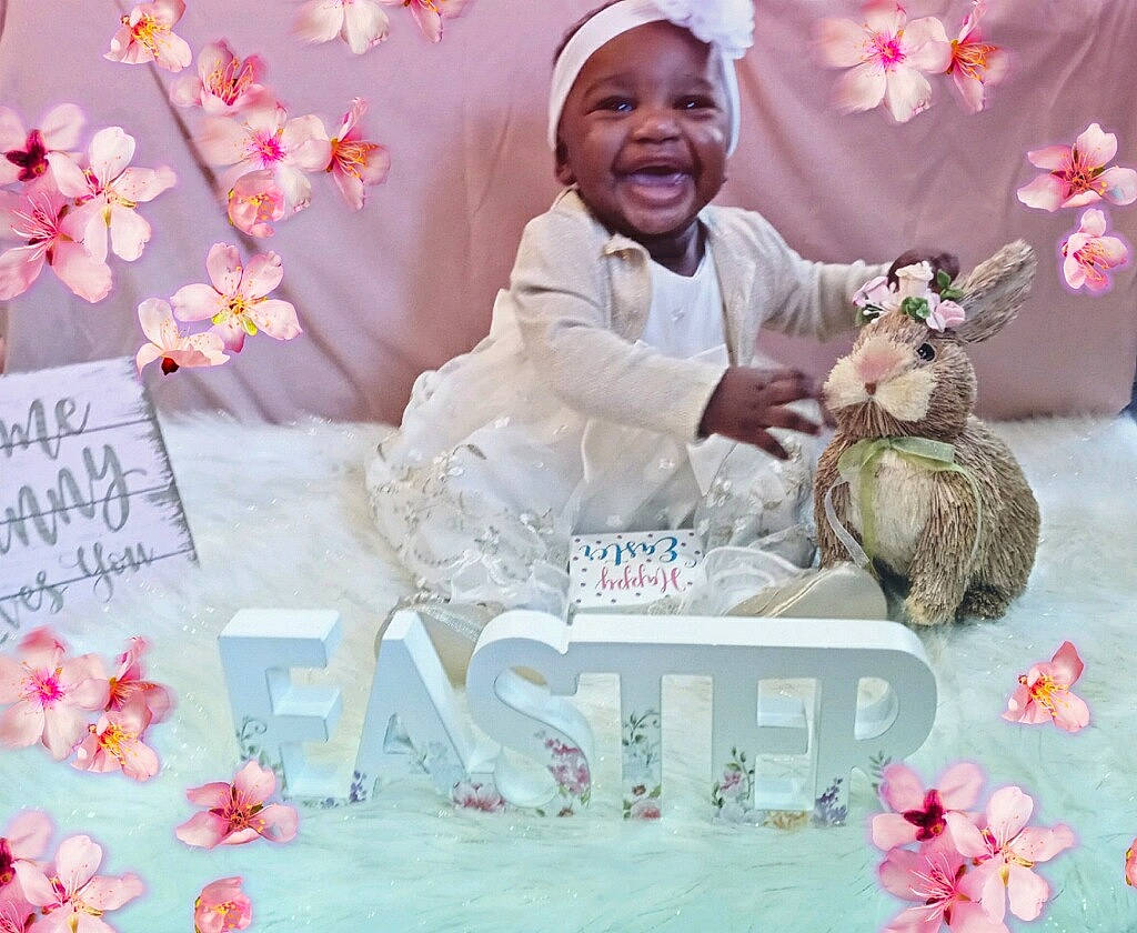 Madisyn is registered to the contest to win money with this photo: baby, baby_toddler_clothing, blossom, child, event, floral_design, flower, font, happy, magenta, party_supply, pattern, person, petal, photograph, pink, smile, sweetness, textile, toddler