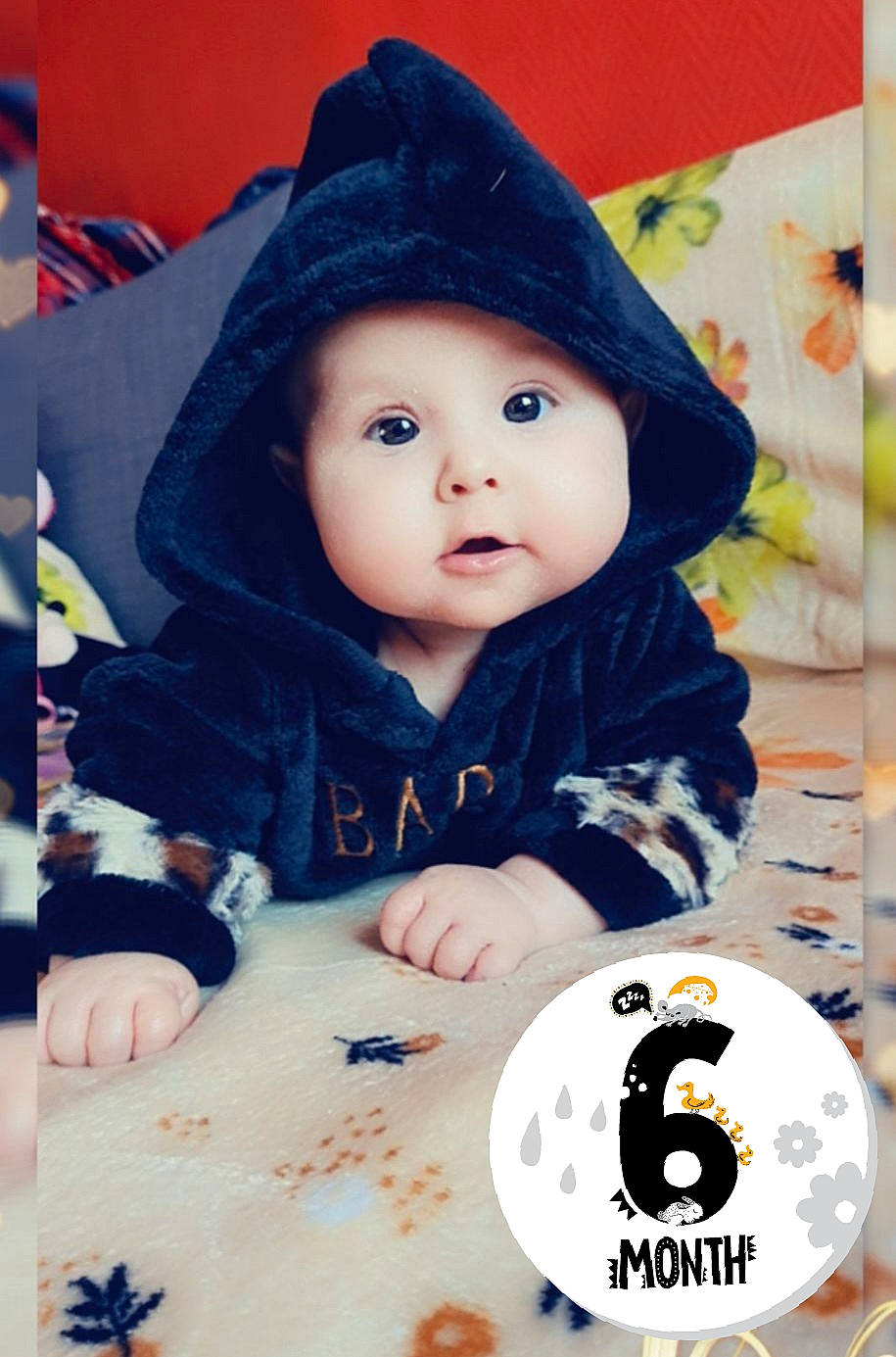 Anais Zeline a rejoint le concours — aidez-le/la à gagner de superbes lots ! baby, baby_toddler_clothing, cap, cheek, child, cool, facial_expression, fun, happy, headwear, hoodie, jacket, knit_cap, person, product, recreation, sitting, sleeve, table, textile