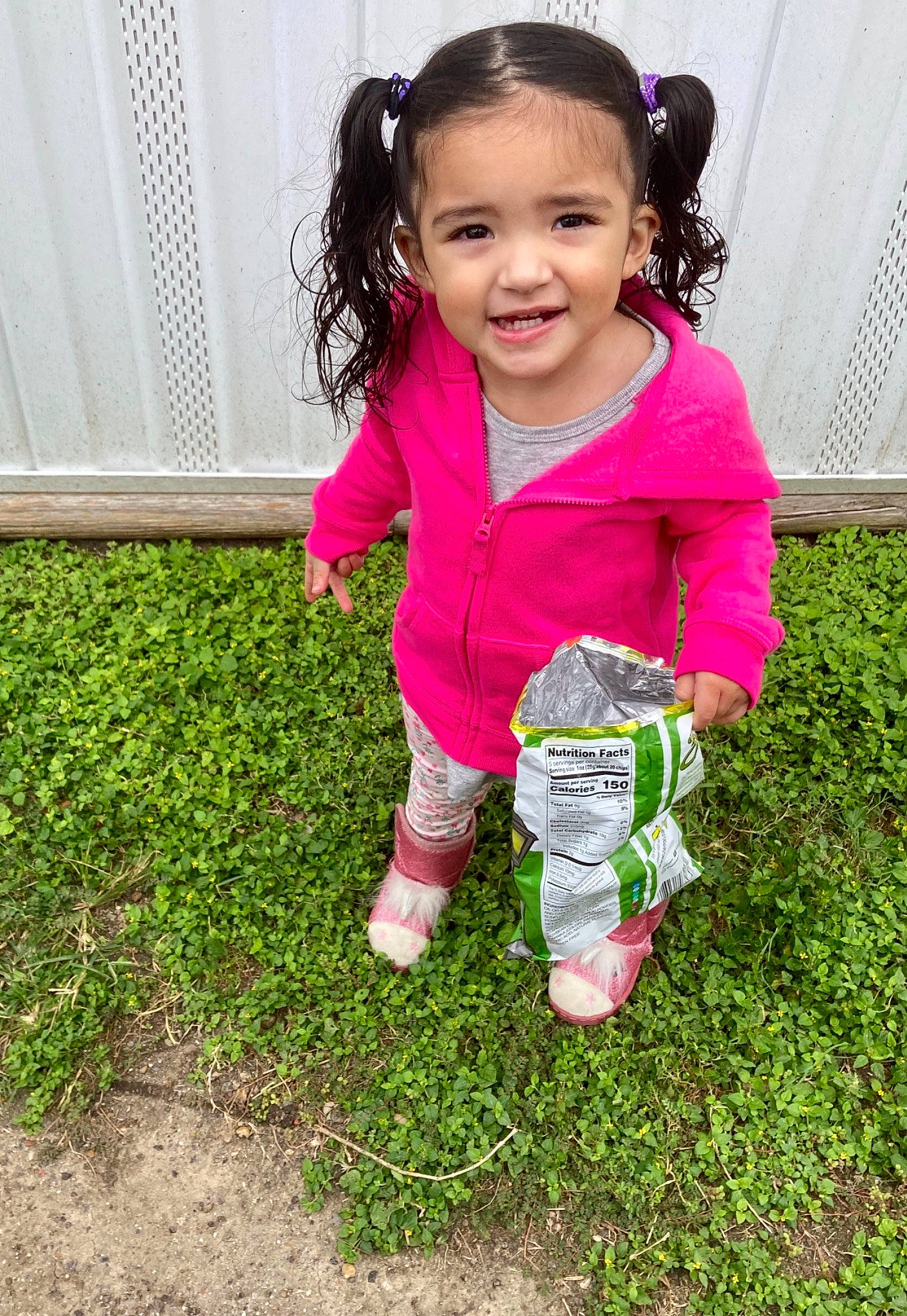 Kayleighn joined the competition — help win amazing prizes! baby, baby_toddler_clothing, child, clothing, door, fun, garden, grass, groundcover, happy, joy, magenta, people_in_nature, person, pink, plant, play, sleeve, smile, soil