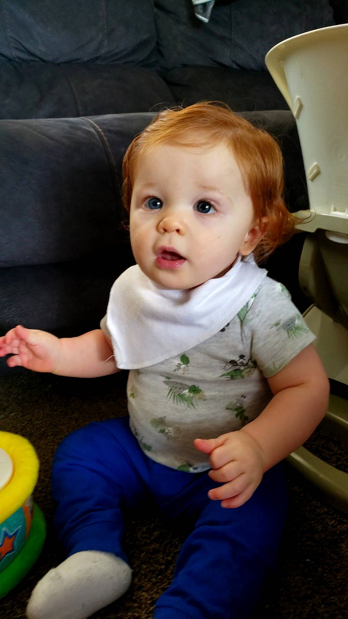 Sonny is registered to the contest to win money with this photo: abdomen, arm, baby, baby_playing_with_toys, baby_toddler_clothing, cheek, child, comfort, finger, fun, hairstyle, happy, human_leg, person, sitting, skin, standing, surprise, t_shirt, thigh