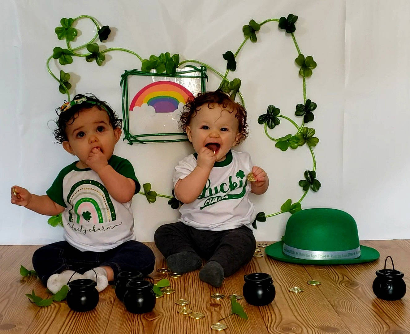 Harper is registered to the contest to win money with this photo: baby, baby_toddler_clothing, baby_toys, child, flooring, flowerpot, fun, green, happy, houseplant, person, picture_frame, plant, play, room, sharing, sitting, sleeve, surprise, t_shirt